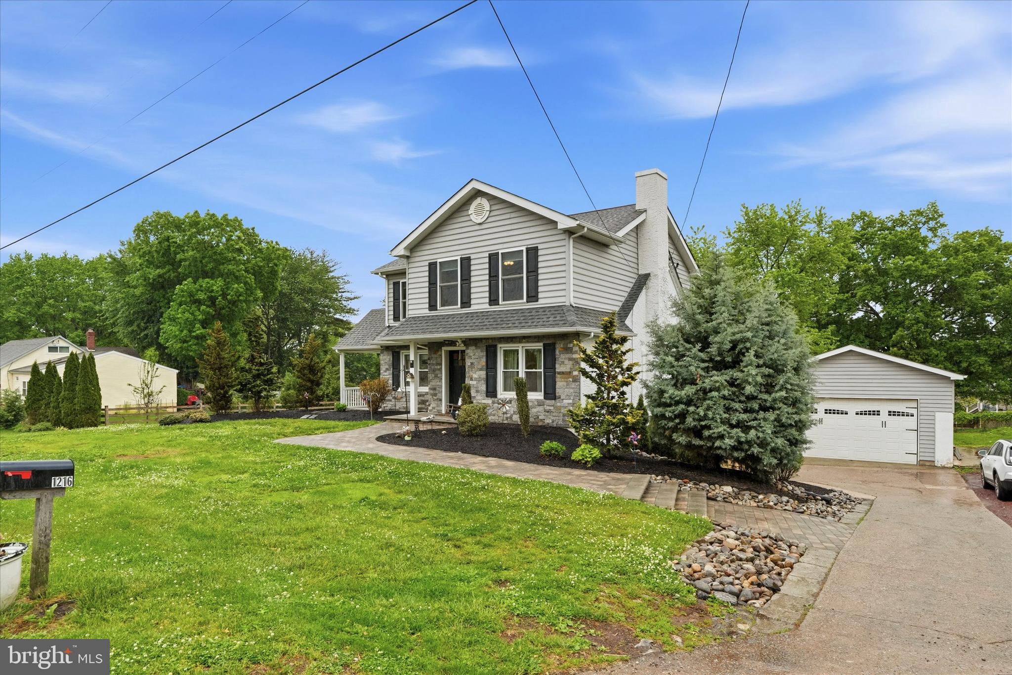 Welcome to 1216 Township Line Road — a beautifully updated home in one of Phoenixville's most desirable locations! Completely renovated in 2018 as the sellers' personal residence, this home was thoughtfully redesigned with quality craftsmanship and long-term ownership in mind. From the stunning $50,000 custom kitchen to the extensive exterior improvements, rebuilt detached garage, updated major systems, roof, and countless additional upgrades, the owners invested well over $200,000 into transforming this property into a truly special home.

Offering three full levels of living space and two separate entrances, the layout is as versatile as it is spacious. The front door welcomes you onto the main level, where you'll find not one but two kitchens — including the impressive custom kitchen addition — along with a bedroom currently being used as a home office and a convenient half bath. Upstairs, the 2018 addition added approximately 1,200 square feet of living space, featuring three bedrooms, two full bathrooms, and a generous walk-in closet.

The finished walk-out lower level may be the home's best surprise. Sitting at ground level with direct access to the backyard, this complete living space includes a bedroom, living room, and full bathroom with shower — perfect as a private primary suite, in-law suite, or guest quarters. There's even room to add a kitchen, creating true multi-generational or income-potential flexibility.

Inside, you'll find spacious living areas, updated finishes, fresh paint, and a layout designed for both everyday living and entertaining. Every major component of the home is only about eight years old, offering peace of mind and modern comfort throughout. The detached garage adds versatility for storage, hobbies, or workspace, while the large backyard provides more than enough room for a future pool, outdoor entertaining area, or garden oasis. Sellers are also willing to work with buyers regarding carpet updates, making this an incredible opportunity to personalize the finishing touches.

Location is everything, and this home delivers. Just minutes from vibrant downtown Phoenixville, you'll enjoy easy access to award-winning restaurants, breweries, boutique shopping, farmers markets, and year-round community events that make the town one of the most sought-after destinations in Chester County. Outdoor enthusiasts will love being close to hiking and biking trails, parks, and nearby Valley Forge National Historical Park, while commuters will appreciate quick access to Routes 23, 724, 113, and 422 for easy travel throughout the Main Line, Philadelphia, and beyond. Located within the highly regarded Phoenixville Area School District, this home combines modern updates, outdoor space, convenience, and the unbeatable lifestyle that makes Phoenixville such a special place to call home.

Originally built in 1949, this home underwent a complete down-to-the-studs reconstruction in 2018 with all new electrical, plumbing, HVAC, ductwork, insulation, drywall, roofing, windows, kitchen, baths, and major systems.