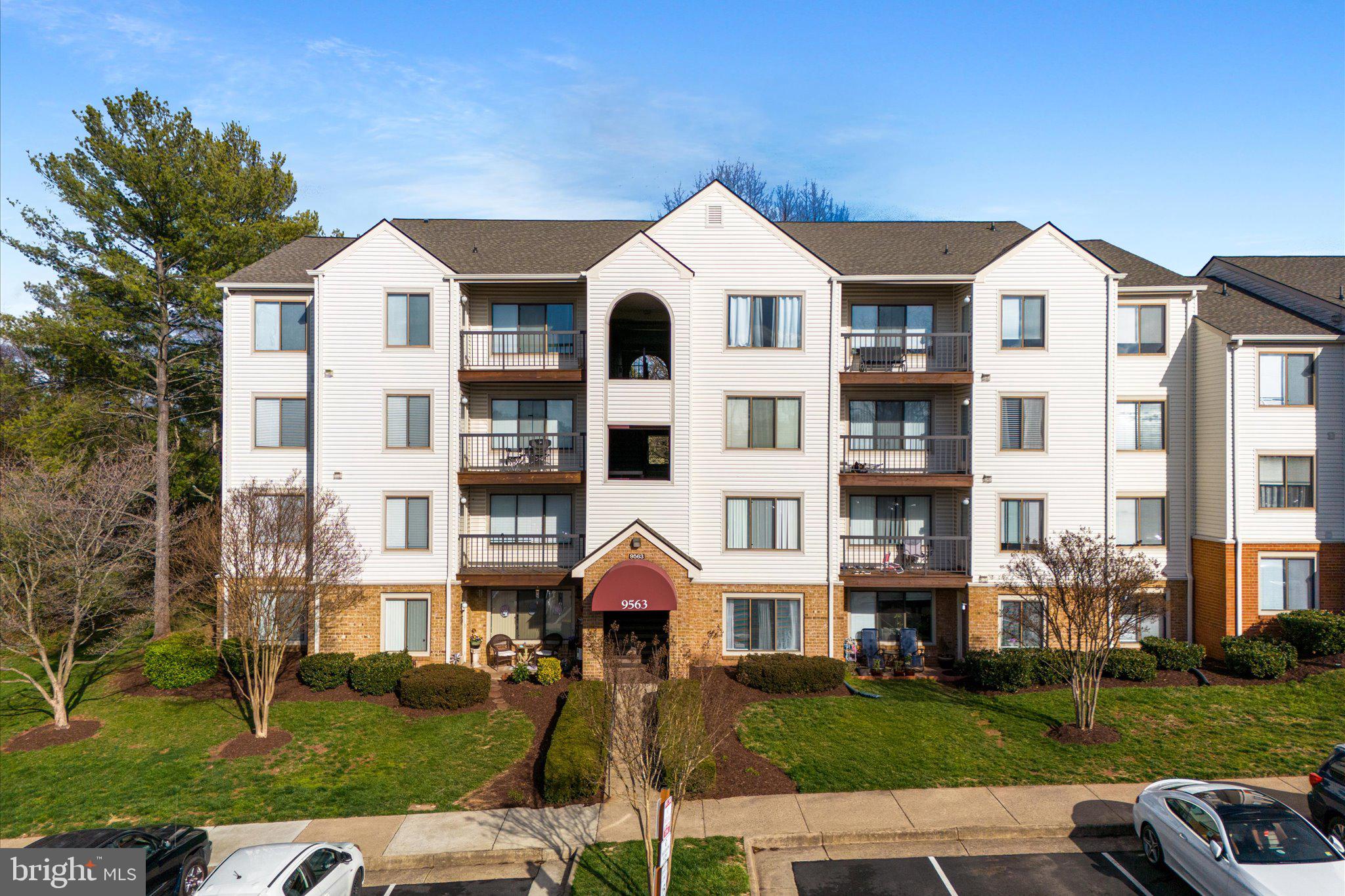 Charming 2 Bed, 2 Bath condo in Battery Heights – Backing to trees & parkland! Welcome to this well-maintained condo with 1,070 square feet of comfortable living space in the heart of Manassas City. Located in the desirable Battery Heights community, this home offers a peaceful setting while still being close to everything you need. Step inside to find fresh paint and hardwood floors in the spacious living and dining areas. The kitchen and both bathrooms feature new LVP flooring, giving the home an updated feel. The kitchen also includes newer cabinets, a refrigerator with an ice maker, stove, and dishwasher along with cozy table space for casual meals. A door leads from the kitchen to your private balcony which backs to mature trees and parkland—perfect for relaxing or enjoying morning coffee. The primary bedroom is tucked away at the back of the unit for added privacy and offers two closets, including a walk-in. The primary bathroom has been refreshed with a new LVP floor,  new tile shower surround, and a new shower door. The second bedroom is located at the front of the unit and features its own  walk-in closet and direct access to the updated hall bath which includes new tile, a new vanity, and new LVP flooring. Additional features include a formal dining room and a full-size washer and dryer that convey with the unit. This condo is a great buy for anyone looking for a move-in ready home with space, updates, and a fantastic location near shops, restaurants, Old Town Manassas, VRE, and major commuter routes.
