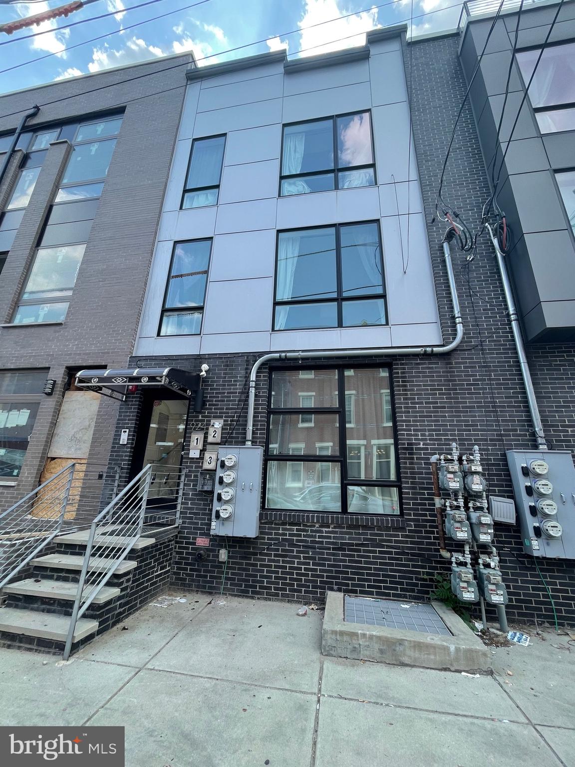 This exceptional triplex investment opportunity is located just one block from Girard Avenue in the highly desirable Fairmount neighborhood of Philadelphia. Fully leased and generating $5,000 in monthly rental income, the property features three modern units with high-end finishes and strong tenant appeal. Unit A is a bi-level 2-bedroom, 2-bathroom apartment on the first floor, currently rented for $1,900/month. Unit B, located on the second floor, is a 1-bedroom, 1-bathroom unit rented for $1,300/month. Unit C sits on the third floor and includes 2 bedrooms, 1 bathroom, and a private rooftop deck, rented at $1,800/month. Tenants are responsible for all utilities, while the owner covers only hallway lighting and sprinkler water, minimizing ongoing expenses.

All three units feature open kitchens with modern quartz countertops, stainless steel appliances, French door refrigerators, 42” cabinets, and breakfast bars. The interiors boast solid birch hardwood flooring, Honeywell Wi-Fi-controlled thermostats, and a video-monitored intercom system. Built new and completed in late 2017, the property benefits from a 10-year tax abatement in place through 2027, offering continued savings for investors.

Located in one of Philadelphia’s most vibrant and walkable neighborhoods, the property is just steps from public transit on Girard Avenue, minutes from I-76, and a short walk to the Philadelphia Museum of Art, restaurants, shops, and green spaces. This is a rare opportunity to own a well-maintained, income-producing property in a prime location with minimal operating costs and significant long-term investment potential.