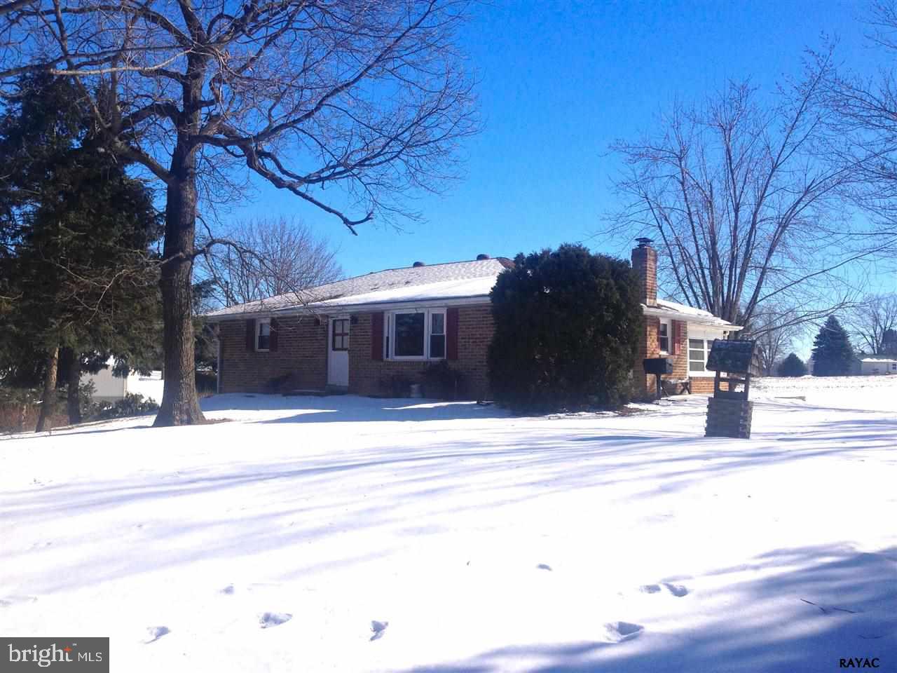 Great brick Rancher on nice 2+ acre lot.  FR, bar, FP, 1/2 bath, 2nd KIT & GAR in daylight BSMT w/ walkout.  Sunroom off main KIT on main level.  Gas hot water baseboard heat & CAC.  Great potential.  A must see!