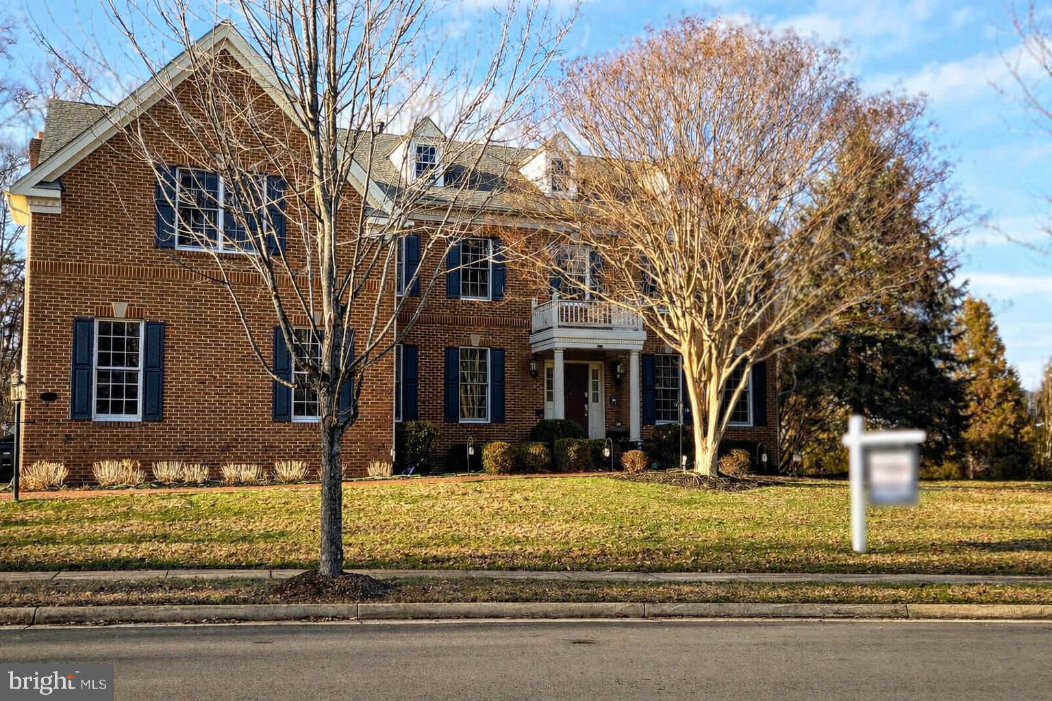 Located in Dominion Valley Country Club, this Colonial offers over 6,000 square feet of finished living space with a functional layout suitable for a variety of needs. The home includes five bedrooms, four‑and‑a‑half baths, a kitchen with an island, and an open family room with a gas fireplace. The finished basement with a rear entrance provides additional living space. Outdoor features include a private patio. Community amenities include pools, tennis courts, and walking paths. A three‑car garage and access to nearby commuter routes add convenience.