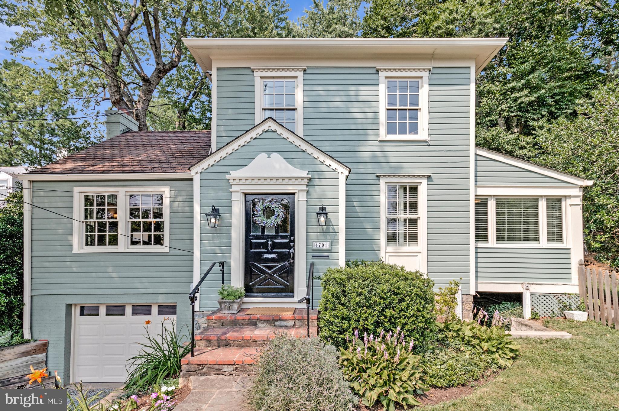 NEW LISTING - OPEN 7/18&19 2-4pm.
Space, light and opportunities abound in this historic Bethesda Colonial 4BR/3BA home. 4701 River Road is an updated and expanded home that offers a move-in ready oasis sited on a huge lot (over a quarter of an acre) and located a mere one-tenth of a mile to the DC line.
 
You will be enchanted by this home as you arrive, with its charming storybook exterior, picket-fenced yard and blooming landscaping. Upon entering the home, you will begin to envision the gatherings you’ll host, because the layout encourages friends and family to come together and enjoy the grand common rooms and the easy indoor-outdoor flow. From the cozy entry foyer, the delightful formal parlor welcomes you with its warm oak floors. A separate sunroom/den with windows on two sides and French that let light flow through the home sits adjacent to the parlor. This space could be perfect as a home office, play room, or cozy reading room.
 
The show-stopping dining room will be the envy of all who visit. This banquet-sized room features soaring cathedral ceilings, a gas fireplace with stone surround, and custom double-height Palladian-style windows flanking the fireplace. Conveniently located across the hall from the smart, efficient kitchen makes hosting dinners a breeze. The spacious kitchen offers stainless steel appliances, warm, quality wood cabinetry, a pantry and an adjoining breakfast room with views to the beautiful side yard. 
 
Next is the expansive family room, a feature not always found in traditional Colonial homes. This one will impress with its size, another gas fireplace, and its beautiful windows on two sides showcasing the stunning lot. Sliding French doors lead to the huge patios, perfect for garden parties and barbecues. Rounding out this level is a spacious bedroom with its own doors to the yard, and an updated full bath with a charming claw-foot tub – an ideal arrangement for those seeking main level living.
 
Upstairs, the primary suite offers an idyllic sanctuary, with its vaulted ceiling, sweet balcony, ample closet space, large en suite bath with double vanities, extra storage, and a stone and tile walk-in shower. Two additional bedrooms, a third full bathroom, upstairs laundry, and a huge linen closet round out this level. And the gleaming wood floors continue on this level.
 
Outdoors, the lot is truly special and can accommodate all types of outdoor fun and gatherings. The large flat area with a classic stone fireplace at one end and mature landscaping all around would be a perfect venue for yard games, while the grand heritage trees and perennial flowering plantings surround the second patio and make a perfect spot for birdwatching or s’mores around a fire pit. The home also offers garage parking and driveway space for 2 additional cars and an unfinished basement for excellent additional storage.
 
If more enticement were needed, this home is superbly located. Literally just seconds away from the DC line and within walking distance (.5 miles) to the Friendship Heights Metro, this home will make your commute a breeze. Friendship Heights also offers excellent shopping (Whole Foods, Total Wine, Trader Joe’s, Bloomingdales) and dining options (Lia’s, Clyde’s, Sushiko, Capital Grille). Outdoor fun abounds with quick access to the Capital Crescent Trail and innumerable county parks and recreation centers.  Located within the sought-after Bethesda-Chevy Chase HS pyramid (Westbrook Elementary, Westland Middle) and with easy access to area private schools.  
 
This delightful home will surprise and enchant you at every turn.