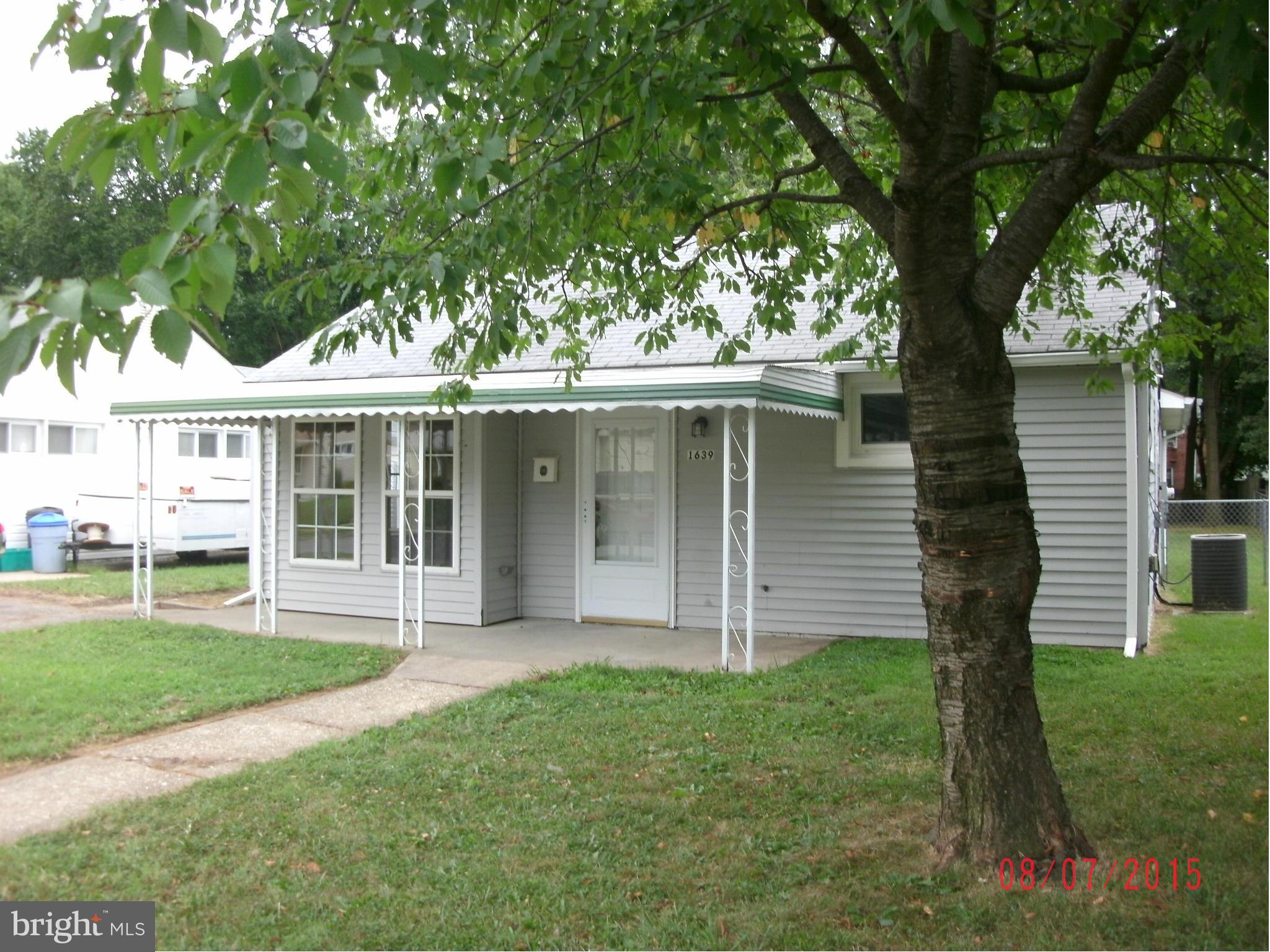 This is it! Great price for a great little recently remodeled rancher with large, fenced back yard! New kitchen and all new appliances including washer and dryer. Family room off large, eat-in kitchen with slider to yard, beamed ceiling and picture window in living room, NEW carpeting, covered front "porch", off street parking. Don't forget this one has 4 bedrooms and 2 full baths. Rm sizes approx
