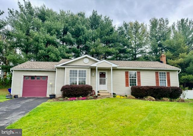 Welcome to this beautifully updated single-family home located in the sought after Liberty East Neighborhood! Tucked back in a quiet cul-de-sac, this 2-level rancher has it all. The main level offers 3 large bedrooms and 2 full bathrooms, which includes the primary bedroom with en-suite bathroom. Fenced in yard with oversized deck, perfect for relaxing! Updated kitchen, large living room and plenty of closet space throughout. Downstairs you'll find a fully finished basement, with large rec room and wood stove, bonus room with built in shelving, and the 3rd full bathroom. Also, downstairs you'll find the laundry room with plenty of storage space. Home has been well maintained and updated! Conveniently located near Libertytown Park and minutes from major commuter highways. You won't want to miss this!