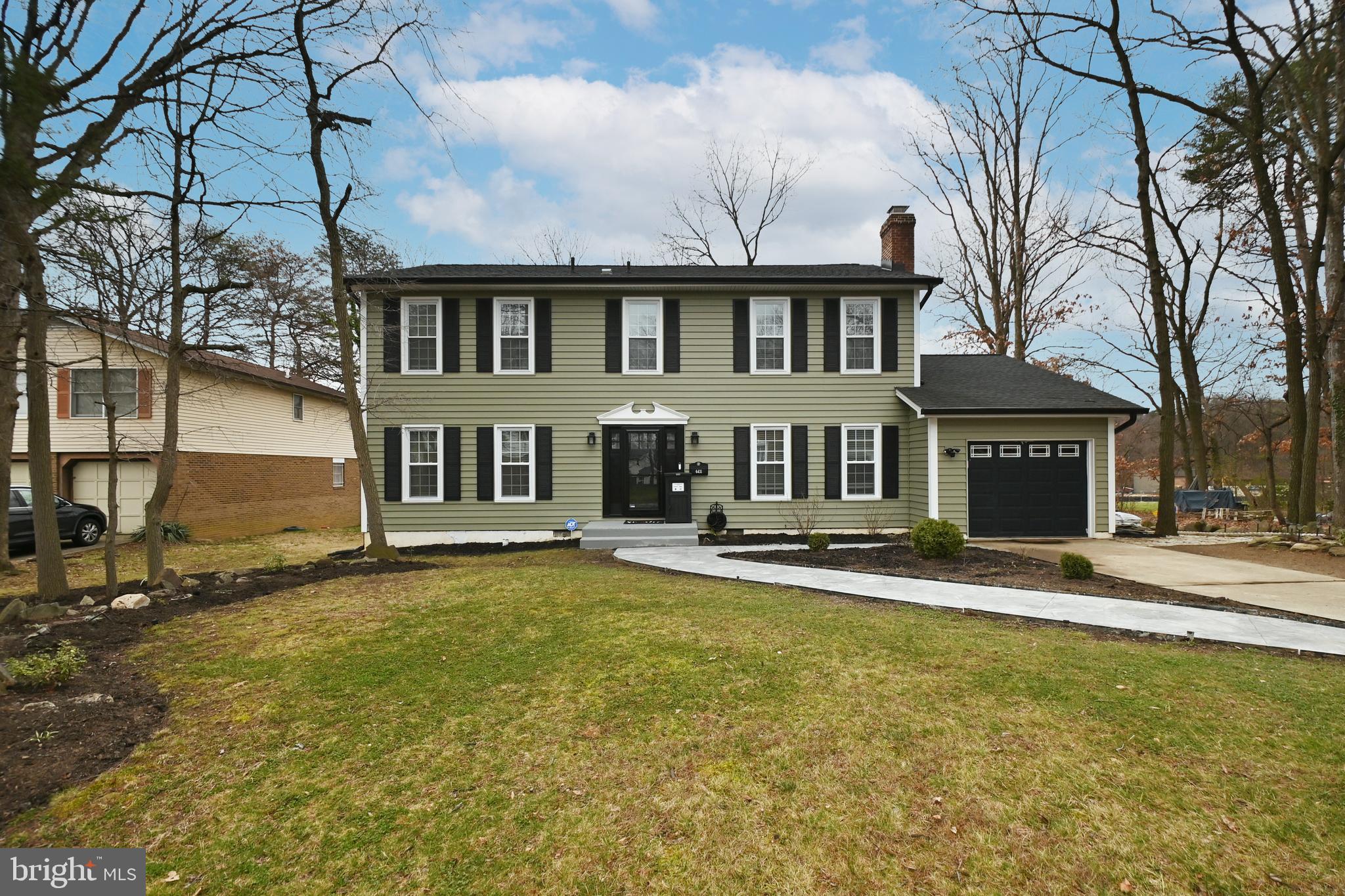 Welcome to 6431 Forest Road in the Town of Cheverly, MD 20785—an updated 4-bedroom, 2.5-bath detached home with over 2,500 finished square feet all above grade on a quarter-acre lot. Set on a quiet, tree-lined street in Cheverly Gardens, this classic colonial gives you the space of a larger home with the convenience of being minutes to the Cheverly Metro (Orange Line), Route 50, the BW Parkway, and the DC line. 

Inside, the traditional floor plan features a generous living room, separate dining room with crown molding, and a comfortable family room off the eat-in kitchen, anchored by a brick fireplace. The kitchen opens to a balcony and rear patio, creating easy indoor-outdoor flow for everyday living and entertaining. Upstairs you’ll find four light-filled bedrooms, including an expansive king-sized corner retreat with walk-in closet and en-suite bath with soaking tub. 

Instead of a dark basement, every square foot of living space here is above grade—bright, usable, and flexible. Need a home office, studio, workout area, or media space? You’ll have options. The oversized two-car garage, currently set up as a home gym with additional storage, plus the wide driveway provide ample parking and utility. 

Out back, a large, fenced yard with central patio is ideal for gardening, outdoor dining, or pets, with room to add raised beds or a play structure if you choose. 

Directly nearby, the Cheverly Community Center offers playgrounds, ball fields, bike paths, a jogging track, and a popular weekend farmers market—one of the many reasons people love living in Cheverly.

If you’ve been looking for more space, a true yard, and an easy Metro commute without sacrificing access to Washington, DC, this Cheverly colonial delivers.