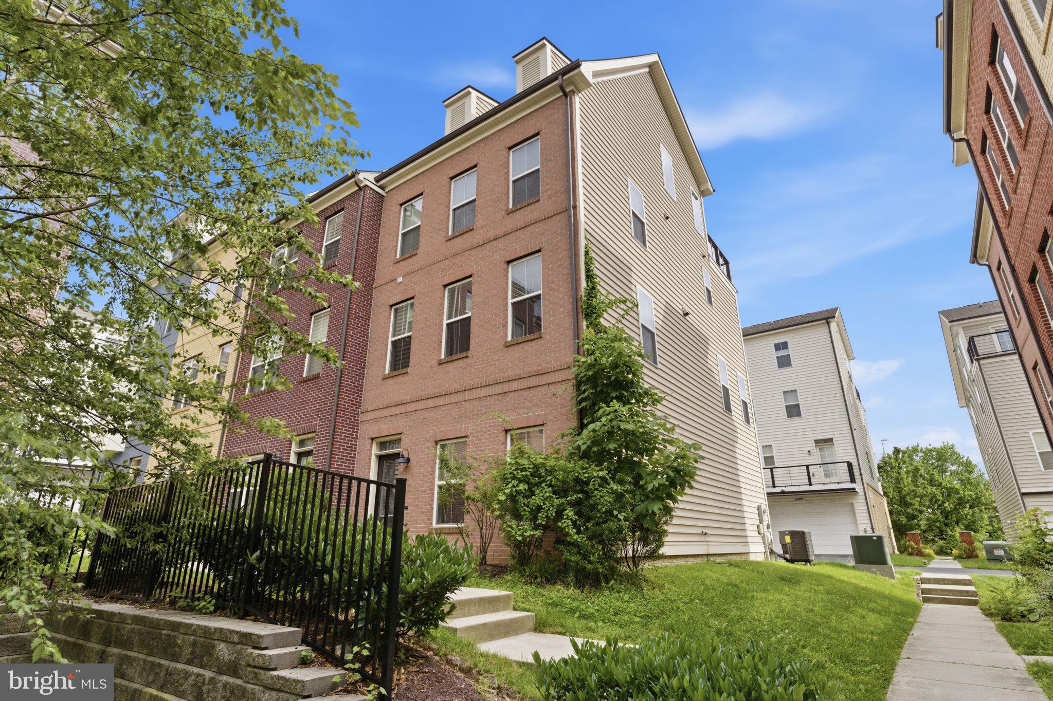 Imagine living just steps from the Glenmont Metro Station in this beautifully maintained townhome built by Winchester Homes. Offering four bedrooms, three full baths, one half bath, a two-car garage, and a private rooftop terrace, this home combines space, convenience, and modern design.

Step inside to find a flexible entry-level bedroom with a full bath, making it an ideal space for guests, a home office, or a private retreat. Hardwood flooring leads to the main living level, where an open-concept layout creates a comfortable setting for both everyday living and entertaining. The stylish kitchen features abundant cabinetry, generous counter space, and access to a private balcony. Just beyond, the spacious family room provides plenty of room to gather with friends, host game nights, or simply relax at the end of the day.

The third level offers two well-sized bedrooms connected by a shared full bath. One bedroom enjoys direct access to the bathroom, while the second bedroom has convenient access from the hallway. A centrally located laundry area on this level adds convenience to your daily routine.

Occupying the entire top floor, the owner's suite provides a private retreat with a walk-in closet, en-suite bath, and direct access to the rooftop terrace. Whether you're enjoying your morning coffee, unwinding after a long day, or spending time outdoors, this private outdoor space extends your living area and creates a perfect place to relax.

Located in the heart of Glenmont, you'll appreciate having Metro access, shopping, dining, parks, and major commuter routes just moments from your doorstep. With its desirable end-unit location, flexible floorplan, and unbeatable convenience, this home offers the space and lifestyle today's buyers are looking for.