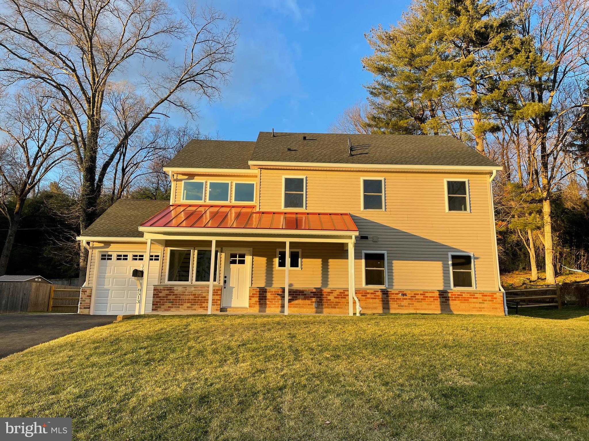 Are you looking for New Construction but don’t want to wait for New Construction? Well, you are in luck. Set on one third of an acre in Wyndmoor is your New Construction, move in ready home. Everything in this home is brand new and has been carefully planned and thought out by the owner and her builder. The curb appeal starts with the red metal roof over the front porch, the new driveway and the luscious front lawn. Enter the front door and to an open floor plan. The kitchen has a huge island with a wooden top (by Stable Tables) that was made from the original homes’ beams. The island has tons of storage and a built-in microwave. Attractive granite counters and stainless appliances and deep sink. To the left of the kitchen is a comfortable built-in bench for taking off your shoes and storage. The Living and Dining area leave you with the option of choosing which area will be for dining and which will be for living. This open area has a fireplace that is beautiful, decorative and provides warmth. The custom built-in cabinets add character to the space. There are sliding doors to the covered back patio. The flow is perfect for comfortable living. Down the hall is a full bath, a bedroom and a bonus room ( 5th bedroom, office, playroom). While walking up the stairs to the second floor you will notice that there are additional windows that make the light permeate the space. On the second floor there is a primary bedroom with a huge walk-in closet. The primary bath has stunning tile work throughout and a large shower with a bench, rain shower and even a shaving hose. There are two additional bedrooms each with double closets. Conveniently, the laundry room is upstairs. Each room has a ceiling fan and large windows that let in the optimum amount of light. The backyard is fully fenced with a double gate to allow for large equipment. There is a lovely, landscaped seating area in the backyard which is a perfect spot for a firepit and some Adirondack chairs. The backyard has plenty of room for running, games or just relaxing. The garage has a back entrance and loft storage area. The attic is also floored for storage. Located in Wyndmoor with easy access to Chestnut Hill, Wissahickon Trails, Public Library, entrance to Rt 309 and the PA turnpike. Close to the new Enfield elementary school and LaSalle College high school. Move right in to this New Construction home and enjoy it from the minute you get the keys.