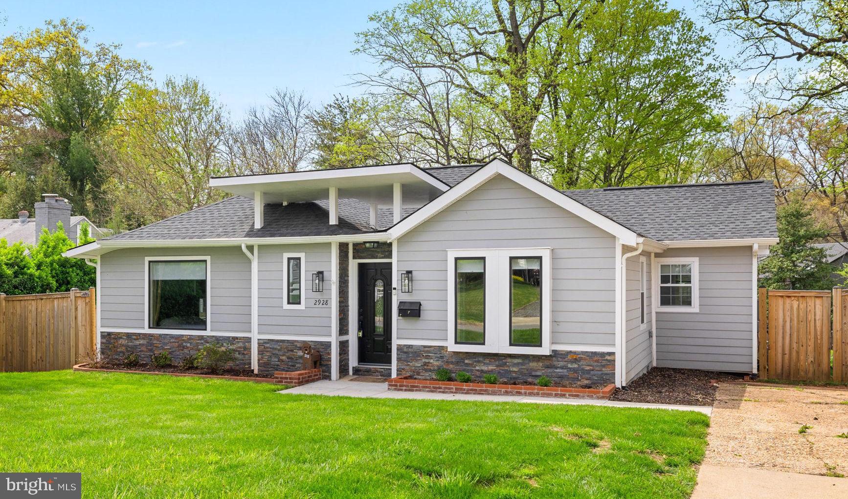 OFFER DEADLINE TUES MAY 6th at 1PM! You'll love this fully renovated 3-bedroom, 3-bath home on a spacious 11,000+ sq. ft. level lot (1/4 acre!), ideally situated between Falls Church City and the Mosaic District. Enjoy effortless access to restaurants, shops, groceries, entertainment, and more.
Inside, everything is new—including the open-concept kitchen featuring stainless steel appliances, sleek white cabinetry, a gas range with new exhaust hood, plus a center island with breakfast bar seating. The primary suite includes a walk-in closet, large windows, space for a desk, and a beautifully renovated en-suite bath with an oversized shower, modern vanity, and designer tile accents. Two additional bedrooms share a refreshed hall bath with a tub.
The open main level overlooks a spacious, light-filled family room below, featuring cathedral ceilings, tall windows, and sliding glass doors that open to the patio and expansive backyard—an ideal setup for gatherings or relaxed everyday living.
Just off the family room, a cozy den with an adjoining full bath offers flexible space for guests or in-laws. A nearby bonus room provides privacy for remote work, a home gym, or quiet focus.
Additional highlights include:
- Low-maintenance HardiPlank exterior
- New designer blinds and shades throughout
- Updated landscaping and a new outdoor shed
- Fully fenced backyard
- Off-street parking in a generous driveway