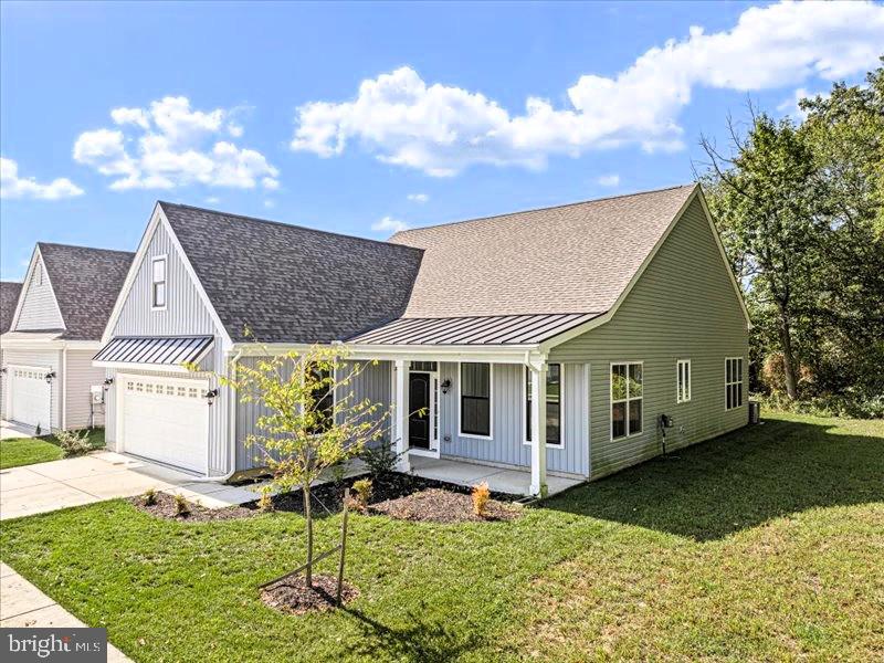This could be the one!  This Lakespur Model is a beautifully upgraded home nestled on a prime lot in the sought-after Nobles Pond active adult community. Enjoy exceptional privacy with a wooded lot next door and mature trees lining the backyard—perfect for peaceful mornings and relaxing evenings. You will love the natural lighting the interior of this home provides. Appreciate the open floor plan w/great room and kitchen area. Kitchen features large center island with granite countertops and area for bar stools, stainless steel appliances, 42" cabinets w/soft close drawers and doors. A nice pantry for added storage. Off the great room, you have a light-filled Florida Room, ideal for year-round enjoyment. The home features elegant upgraded light fixtures throughout, adding warmth and style to every space. A versatile flex room offers endless possibilities—use it as a formal dining room, home office, or guest retreat to suit your lifestyle. Private 1st floor laundry room complete with upgraded washer & dryer.  The primary suite is a true retreat, featuring a unique sitting room area,  oversized walk in closet and private bath w/walk in shower and comfort level double vanity. Added touches are the tray ceilings, upgraded vinyl wood style plank flooring and more.  Nobles Pond is one of Delaware's premier 55+ active adult communities w/resort style amenities, social clubs and walking trails.  Whether you enjoy relaxing around or in the saltwater olympic size pool, water aerobics, large fitness room w/high end equipment, health centers for yoga, zumba, game rooms for billiards, darts, cards and craft areas, a library, there is always a calendar full of fun, entertainment, health and more. Best of all the on-sight lifestyle director who is always keeping the calendar full of exciting things to do.  (trips, dances, plays, speakers and more).  Enjoy a central location just minutes from shopping, dining, medical facilities, and downtown Dover.  Easy access to Route 1 for trips to the beaches, Wilmington, or Philadelphia. New Jersey, Pennsylvania, D.C., Maryland and Virginia is driving distance.   This home with its features and thought out upgrades is a home not to be passed by.  Be sure to see this home.