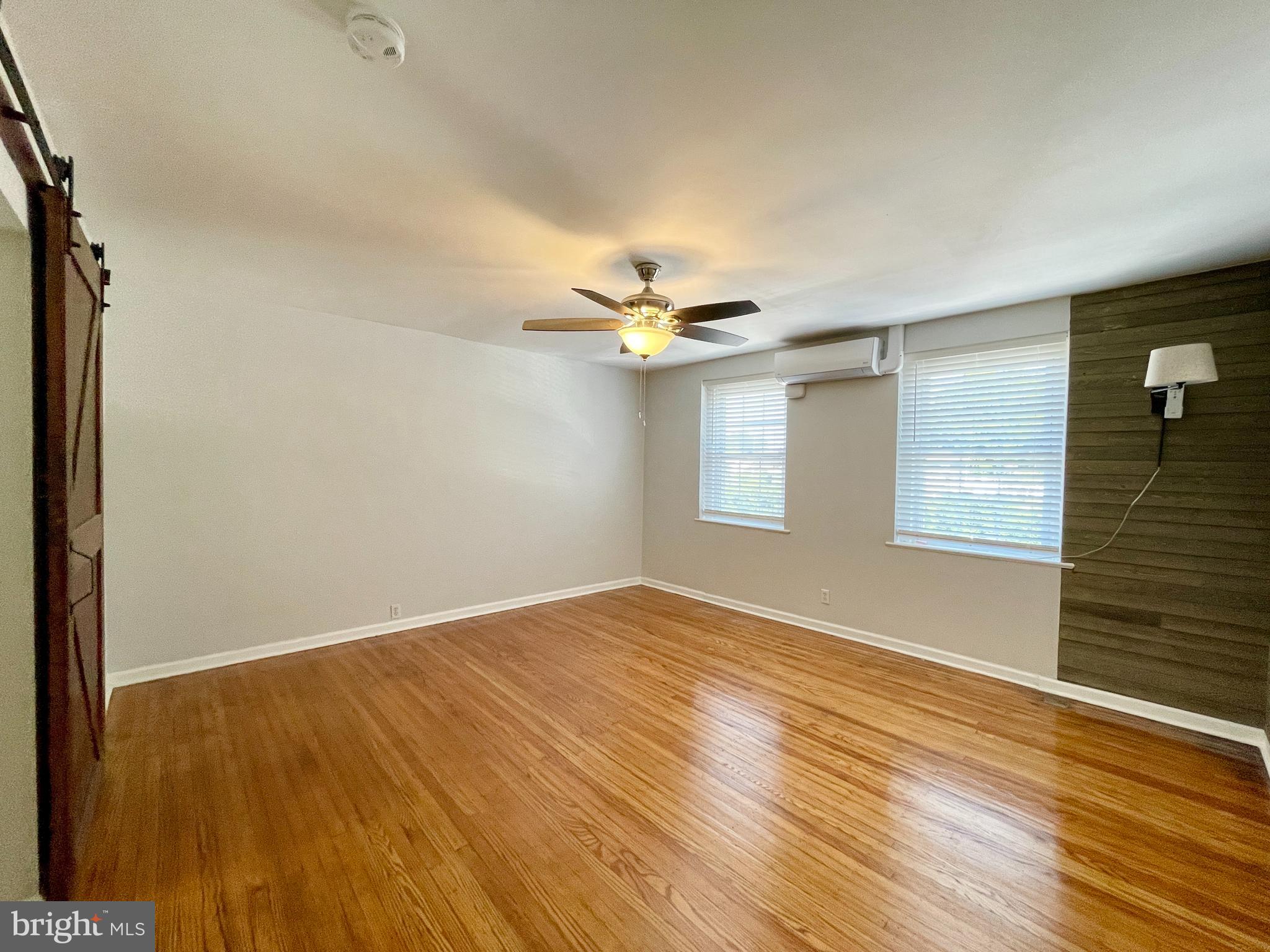 Newly renovated second floor efficiency  apartment.  This sun-filled unit features a newer kitchen,  separate living/sleeping area, and an updated tile bath with skylight.  Additional amenities include central A/C and refinished hardwood flooring.  Heat, A/C, and water are included in the monthly rent.  Close to shopping and  public transportation.  Move-in ready.  Call to schedule a showing today.  Tenants, please apply through the RentSpree link (provided by listing agent).