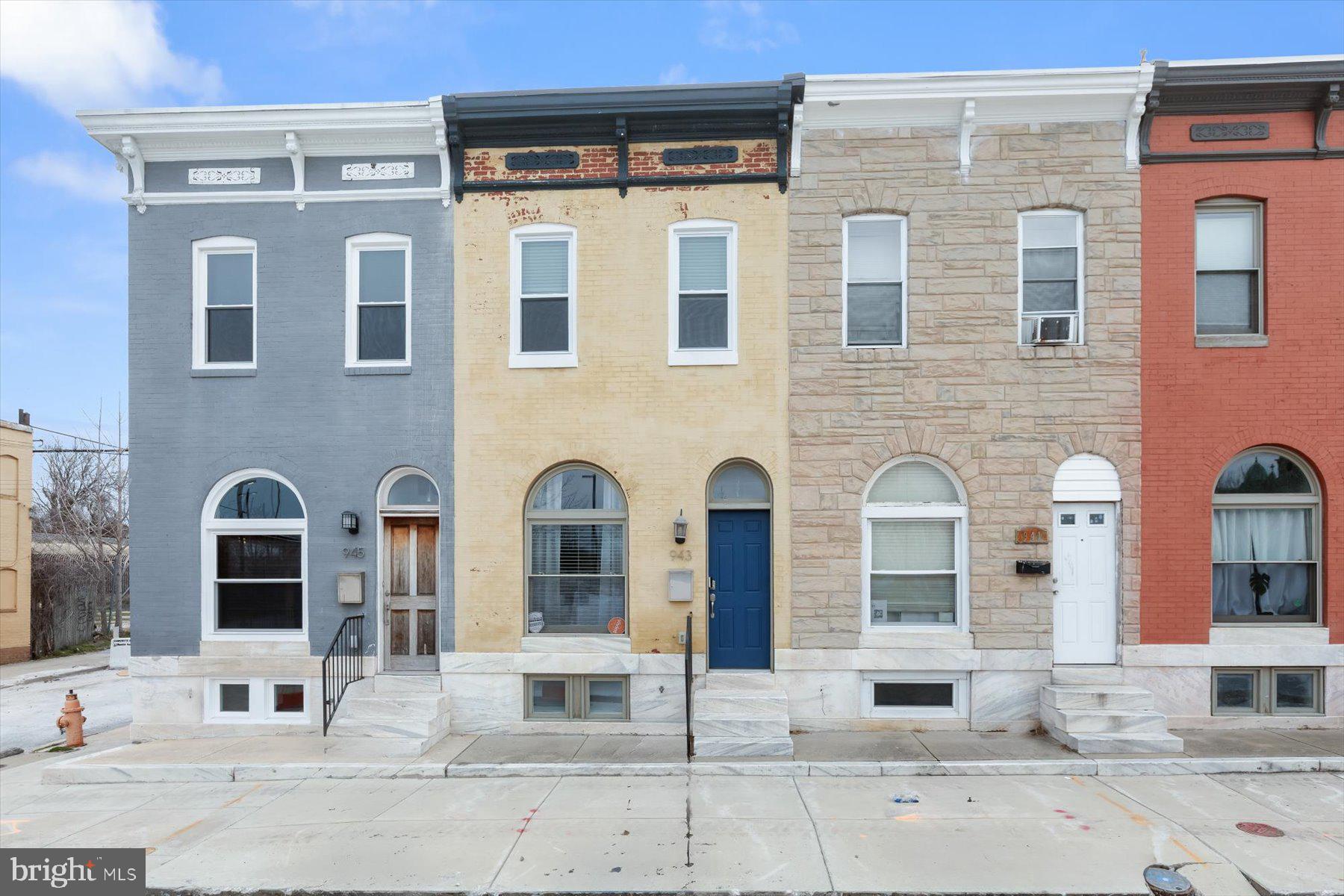Welcome to this beautifully updated three-level townhome in the heart of Baltimore, offering the perfect blend of classic charm and modern convenience. This spacious residence features approximately 2,066 square feet of living space with 3 generously sized bedrooms and three and a half bathrooms. The sun-drenched main level showcases tall windows, warm hardwood floors, and an open-concept layout that seamlessly connects the inviting living room to a bright, modern kitchen and adjoining family room...ideal for entertaining or relaxing at home.

Upstairs, you’ll find three well-appointed bedrooms, to include a Primary Suite,  with updated flooring and ample natural light, along with two full bathrooms designed for comfort and functionality. The fully finished lower level provides exceptional flexibility, complete with a bonus room that can be readily used as a 4th bedroom, full bath, and dedicated laundry area...perfect for a guest suite.

Additional highlights include a recently replaced roof, ample parking in front and back of the home, updated flooring, recently painted, Skylights, updated bathrooms and a private fenced backyard patio... ideal for outdoor gatherings, and a location within walking distance to the abundant amenities that Baltimore has to offer. Built in 1920 and thoughtfully updated, this home combines timeless character with modern upgrades, making it a turnkey opportunity in a growing East Baltimore neighborhood.