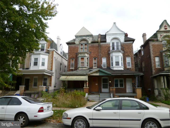 Large Twin Porch front Fired damaged 3 Family triplex close to University City and renovation was started on this Hugh stone property. The multi family unit has 3- 2 bedroom apartments. The property has sustained fire damage and is in need of repair. Property is sold in as is condition, All offers will be presented. buyer is responsible for u/o and title is good. $2000 minimum deposit and proof of funds.