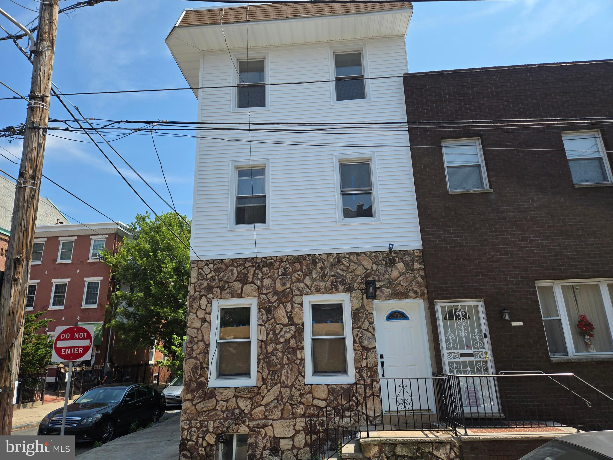 Fantastic location! In the heart of South Philadelphia, this house is located close to restaurants and bars in a quiet residential section with panoramic views of Philadelphia skyline from the upper floors. Its corer property with wide sidewalks and new tree planters. Renovated in 2025 this house offers high quality finishes combined with several special features. UNIQUE GUEST SUITE in rear of the property with separate entrance, bath and a loft; 2 rooms and bath total. Perfect for office, teens, student rental or in-law suite. Separate side entrance to kitchen as well. OTHER SPECIAL FEATURES: one of the bedrooms has a additional room perfect for office, large closet or baby room. Electric fireplace with a real marble veneer wall and a TV mount. This is great corner property rarely found in this area. Great area for a great city lifestyle. Potentially an incredible Airbnb/short rental or a high-end rental property, Lots of new construction and renovations.  Only 7-10 minutes from center city, Washington Square, Old City/ Society Hill. OPTIONS OFFERED:  At additional Cost which can be rolled into purchase price owner can 1. Remodel basement to full modern standard with additional bathroom AND/OR kitchenette or bar; 2. install kitchenette in the rear suite (cost depends on options chosen)