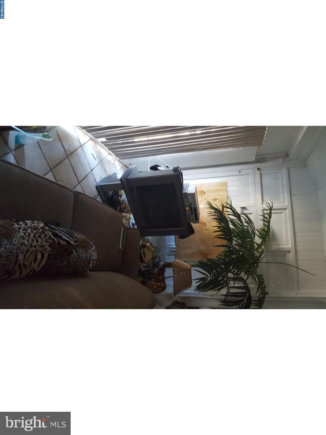 Large Row Home, 3 Bedroom, 1 Bath, Formal Living and Dining Rooms. House is a very nice home, just needs your personal touches. Up and coming area.