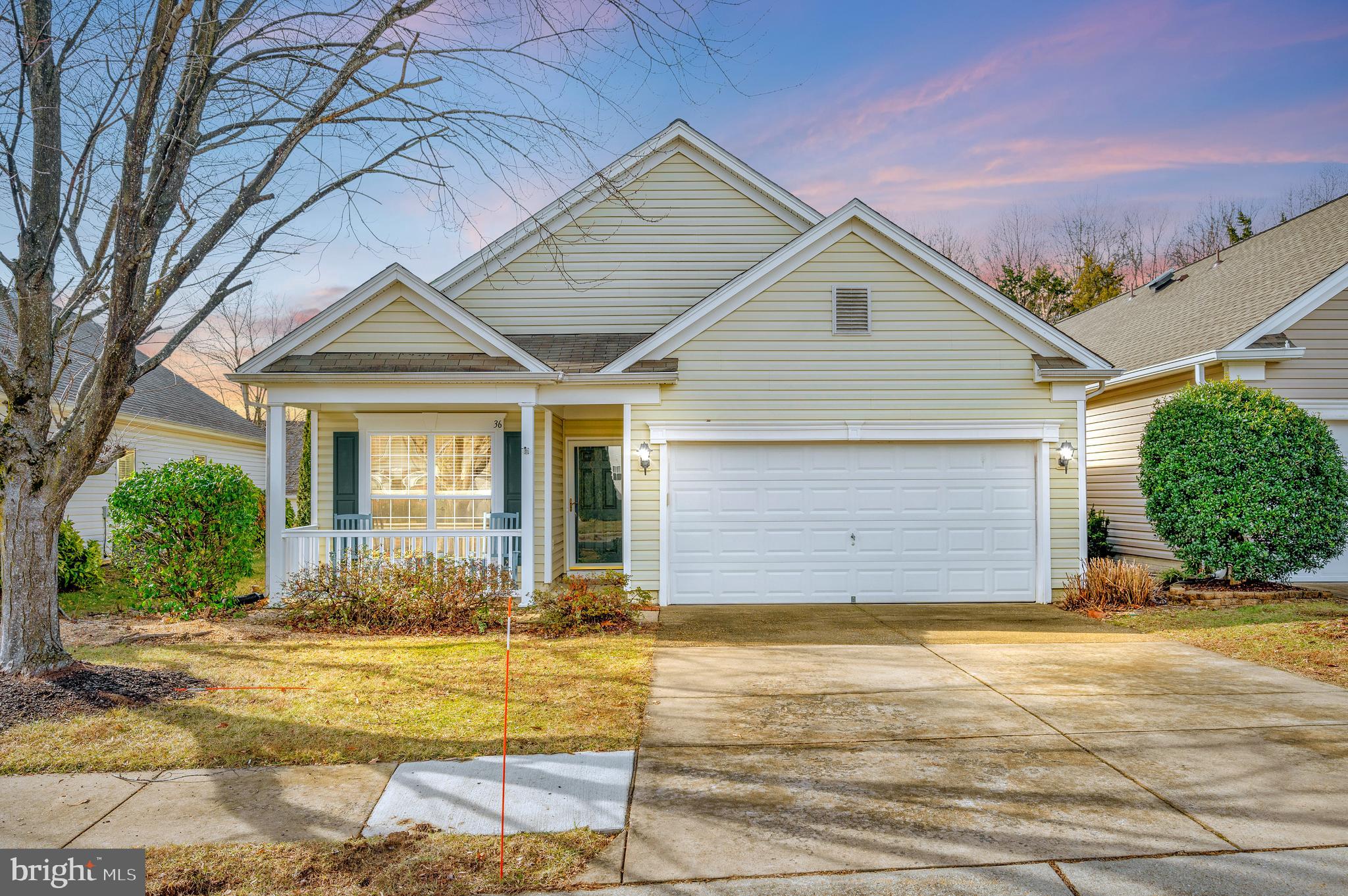 Welcome to this inviting single-family home located in the desirable gated community of Falls Run 55+ Community. Conveniently located near the clubhouse, which offers an array of amenities including indoor and outdoor pools, tennis courts, and a variety of planned activities. This beautiful two-bedroom, two-bathroom home features convenient single-level living. Relax on the charming front porch. Hardwood flooring in the family room, dining area, and bonus sunroom. The kitchen is well-equipped with a pantry and ample countertop space. Kitchen opens to the dining area. The family room is cozy and bright, complete with a ceiling fan for added comfort. The sunroom, with its abundance of windows, provides natural light. A sliding glass door leads to the patio, where you can enjoy the peaceful, landscaped yard that backs up to trees. The spacious primary bedroom offers a large walk-in closet and an en suite bath with a double-sink vanity and a shower with a seat. Laundry area with a utility sink. 2 car garage with room for extra storage. Located near shopping, dining, and highway access, this home offers both convenience and comfort in an active community. Don’t miss out on this fantastic opportunity—schedule your tour today!