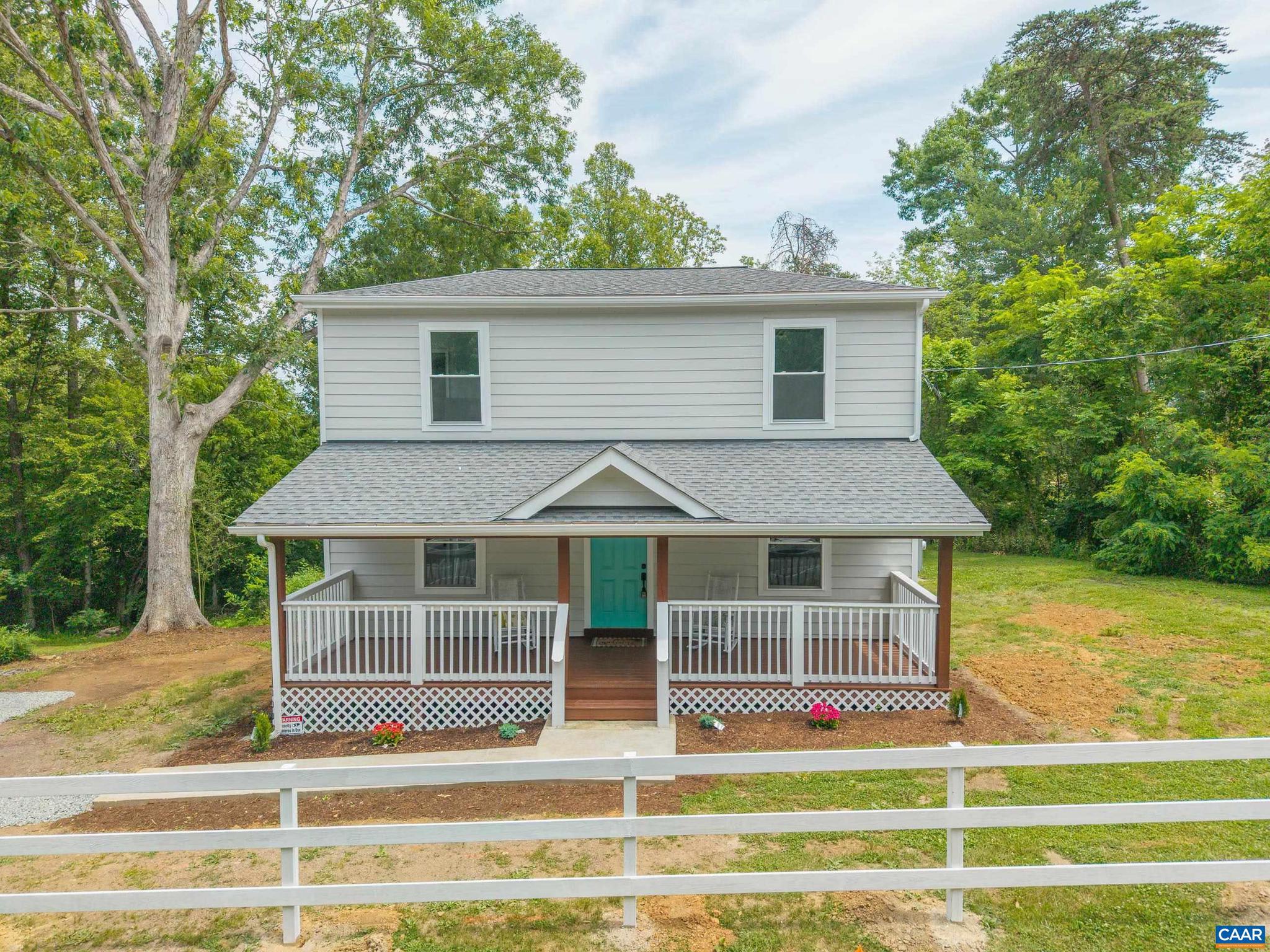 Sunday June 14 1-2PM Open House. Why wait for new construction when you can have the best of both worlds, a completely renovated home set on a beautiful acre lot with mature trees and established surroundings? This home has been completely rebuilt from the studs up with new framing, roof, plumbing, electrical, HVAC, flooring, and hot water heater, kitchen, bathrooms and more, offering the peace of mind of having a new home while retaining charm. Minutes from renowned vineyards, less than 20 minutes to NGIC, 15 minutes to Gordonsville, and only 30 minutes to Downtown Charlottesville, this property combines convenience with peaceful living. Inside, every detail has been thoughtfully updated, including new durable HardiePlank siding, marble countertops, and beautifully tiled bathrooms. The upstairs primary features a spa-like tiled shower with dual shower heads and a spacious walk-in closet. A main-level bedroom offers added flexibility, while the additional upstairs bedroom and loft space provide room for guests, a home office, or second living area. Enjoy quiet mornings on the covered front porch or entertain on the large rear deck overlooking the spacious backyard. Move-in ready and renovated with quality craftsmanship throughout.