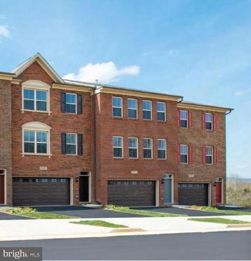 PRICE IMPROVED! Like new Winchester Homes, Kelson model townhome. Full brick front overlooking two car garage with spacious driveway. Walk into your dream home and enjoy from day 1. This turn key property boasts upgrades including a finished basement rec room and bath, privacy 6' fenced back yard, 2 tier trex deck with additional screened in porch ($40k upgrade), garage shelving units, upgraded lighting package throughout, SS appliances, Granite Counters, 42" cabinets, custom built-in shelving in the pantry, hardwood floors and stair cases, a brand new ROOF with Architectural Shingles and much more. This light filled unit has vinyl clad, energy efficient windows with plantation shutters throughout. On the top floor, experience spacious bedrooms with ceiling fans and large closets. Upgraded bathroom tile and light fixtures enhance this already stunning home. Finally, the large master bedroom with private en suite and massive walk in closet with custom built ins. VOP II is surrounded by Leopold s Preserve complete with 380 acres of permanent land conservation owned and managed by The White House Farm Foundation  and includes 7 miles of natural surface walking trails, observation areas and wildflower meadows.  This home won't last long!