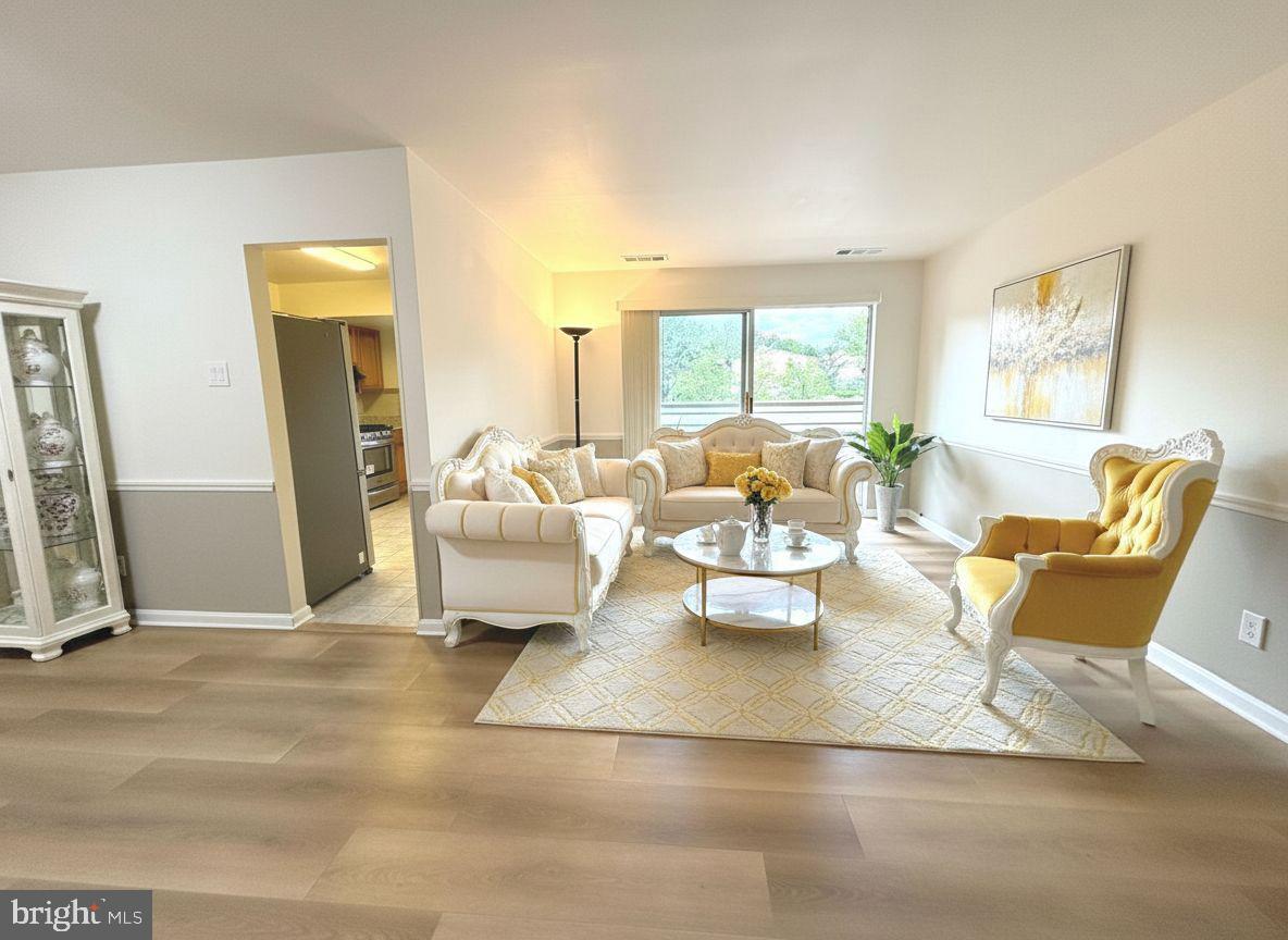 Stunning 2025-Remodeled Condo in Montgomery Village!

Welcome to 19425 Brassie Pl #303, a beautifully updated top‑floor condo offering modern living, abundant natural light, and a move‑in‑ready interior. Renovated from top to bottom in 2025, this home blends style, comfort, and convenience in one of Montgomery Village’s most desirable communities.

Step inside to an open, airy layout featuring 1 year new LVP flooring throughout, creating a seamless, contemporary feel. The fully updated kitchen shines with granite countertops, refreshed cabinetry - perfect for everyday cooking or entertaining.

The home’s two remodeled bathrooms offer a spa‑like experience with modern finishes, updated vanities, and sleek tilework. Every room feels bright and inviting thanks to all-new windows installed in 2025, enhancing energy efficiency and comfort year-round.

Enjoy spacious bedrooms, generous storage, and a private balcony ideal for morning coffee or evening relaxation. With thoughtful upgrades and timeless design choices, this condo delivers the perfect blend of quality and value.

Located in a well‑maintained community offering ample parking, swimming pool, playground,  minutes from shopping, dining, parks, Lake Whetstone, and major commuter routes, this home offers both convenience and lifestyle.  Best part: Condo fee includes all utilities!

Key Upgrades (2025):

New kitchen countertops

New LVP flooring throughout

All new windows

Two fully remodeled bathrooms

Fresh, modern finishes throughout

This is the turnkey home you’ve been waiting for—schedule your showing and fall in love!