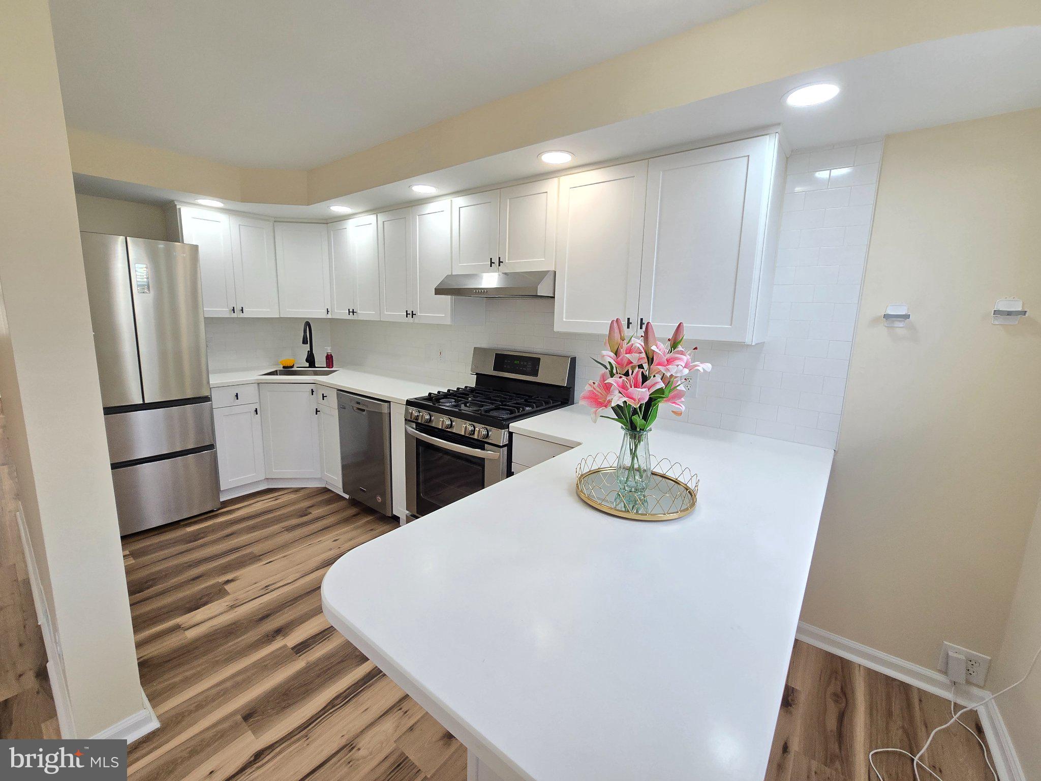 The home you've been waiting for has finally arrived in Overbrook Park - and if you've been waiting on a sign, well this is it! No added fluff, and it's even better in person! This beauty features three spacious bedrooms, two gorgeous FULL bathrooms (2nd floor and basement), central AC, wood flooring throughout, a beautiful kitchen with stainless steel appliances, recessed lighting, a fully finished basement with walkout to rear yard and driveway, picturesque front patio, ceiling fans in every bedroom, ample storage and yard space, tons of natural sunlight and so much more! This home exudes pride in ownership and is without a doubt, noteworthy. This home also qualifies for several first-time homebuyer grants and down payment assistance programs, but income restrictions may apply with some. Open House on Saturday, June 27th from noon until 2pm. Stop by, take a tour, and fall in love! This is an amazing opportunity to own an end-of-row with all the bells and whistles!