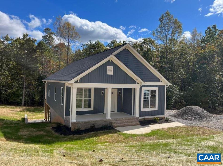 Welcome to The Briery Creek with basement by Rock River Homes in Scottsville, perfectly tucked away on 3 acres in a quiet cul-de-sac lot located in the Forest Ridge Subdivision! This carriage style home is just over 1,400 sq.ft. of main level living with 3 bedrooms, 2 full baths, cathedral ceilings, granite countertops throughout, LVP flooring, kitchen island, covered rear porch & more! The full unfinished walk out basement offers endless opportunities to grow and meet your family's needs! Just minutes from the charming town of Scottsville where you can enjoy access to the James River, fine dining, antique shops, live music and more!