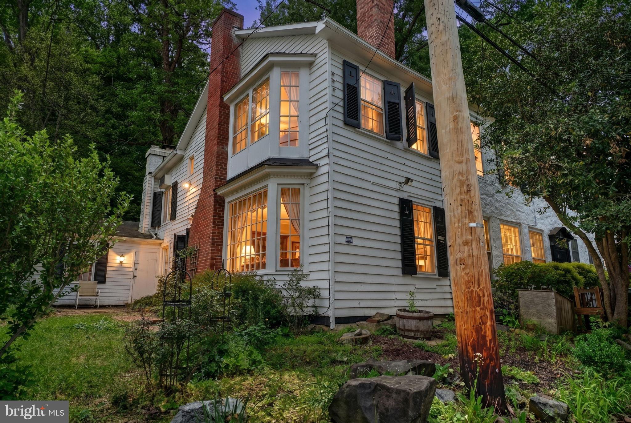 Nestled in Baltimore’s beloved historic Dickeyville District, this charming semi-detached cottage blends timeless character with thoughtful updates. Originally connected to the mid-19th century Dickeyville general store, the home showcases unique period details including a decorative brick bread oven, cozy wood stove, Dutch rear door, and beautiful bay French doors overlooking the picturesque village and surrounding parkland. The rear yard backs to Gwynn Falls Park, offering a peaceful outdoor setting complete with a quaint picket fence and patio.

Enjoy the charm of a tight-knit village atmosphere while remaining conveniently close to major commuter routes, shopping, dining, and all that Baltimore has to offer.