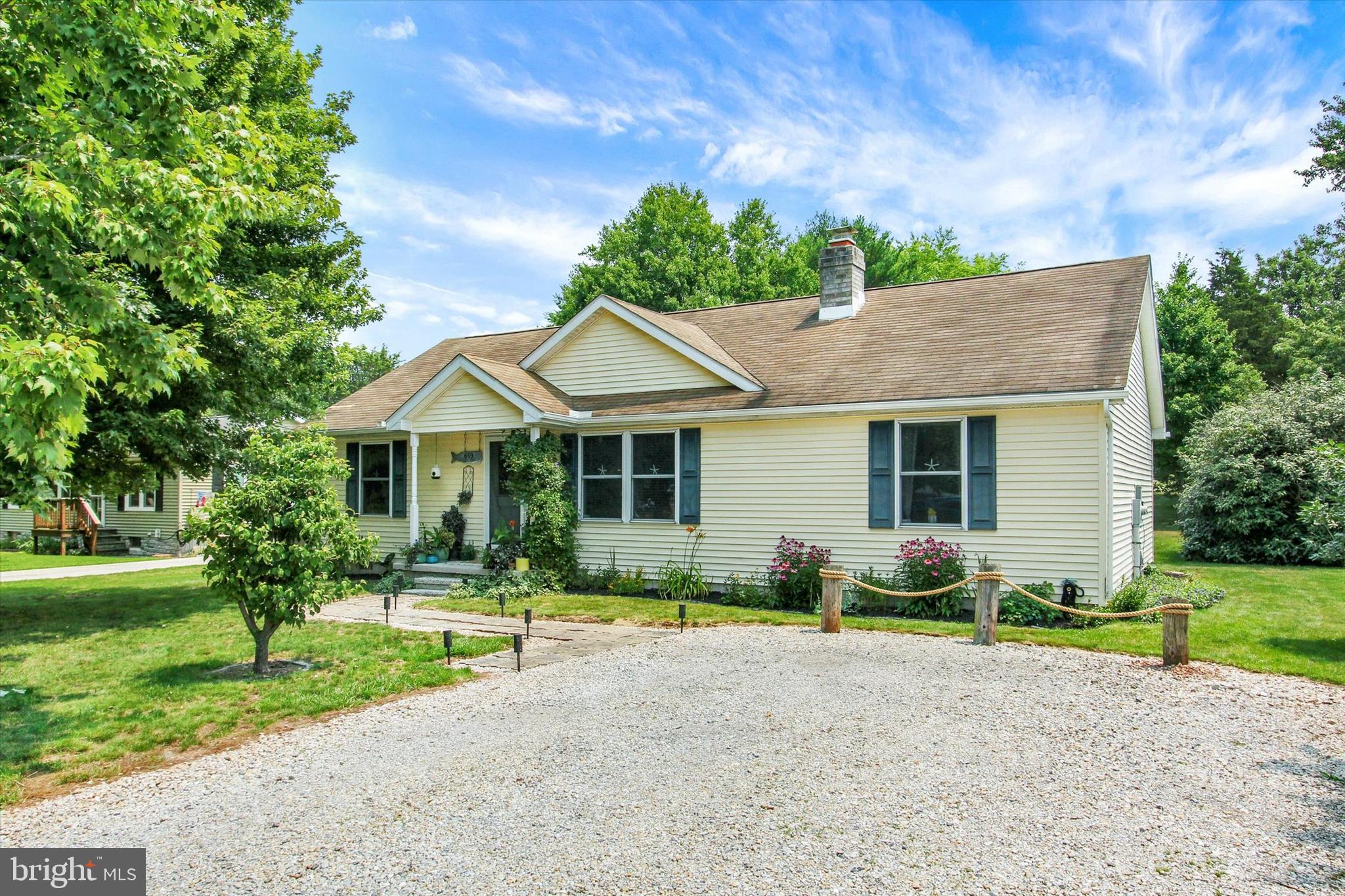 Just a great, affordably-priced, 3 bedroom, 2 full bath 1400 sqft rancher on .36 acre level lot in Lake Heritage, convenietly located just 10 minutes from Historic Gettysburg Square and battlefields.  The cathedral ceiling covering the great room (kitchen/living/dining areas) makes this house feel even larger than it is.  A brick-front wood-burning fireplace adds warmth and character.  And the primary bedroom features a walk-in closet, ceiling fan and full attached bath with both a bathtub and a tub/shower combo.  Other great features include a laundry room, an island in the kitchen for extra seating and entertaining,  and a rear paver patio. All this on a 150 acre lake offering water-skiing, fishing,  pavilions, community center, olympic-sized pool, dog park and hiking trail, basketball, beach volleyball, tennis, playgrounds, shuffle board, activities, etc.  Located on Rts 15 and 97 for easy commuting!