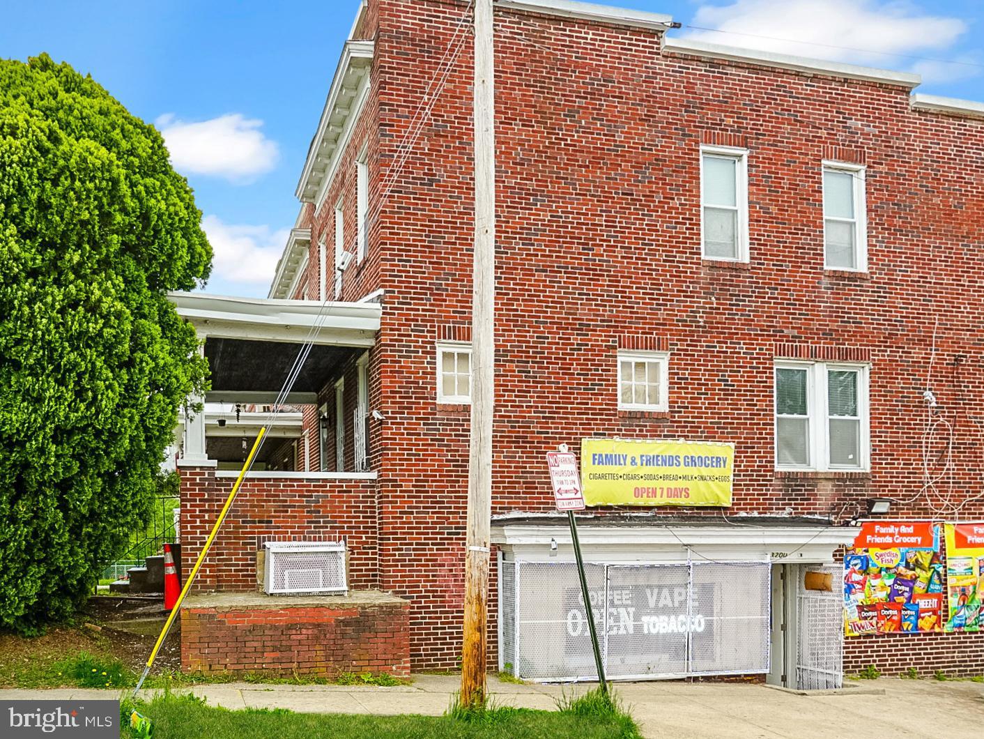 Excellent investment and/or owner occupant opportunity; the numbers work! This recently refurbished 2-unit, end-level townhome has a spacious, renovated 3 bedroom with den that is turnkey and move in ready.  Home features updated kitchen with all new stainless appliances, new flooring, updated full and half bath, skylight, formal living and dining room area, rear deck area, cozy front porch, new washer-dryer, neutral decor, plenty of storage space and more.  The basement unit is a staple neighborhood grocery store, currently on month to month lease ($1500/month), but tenant willing to extend.  Upstairs unit could generate over $2,000/month rental income; great for rental income or primary residence.  One block from trails at Gwynn Falls Park.  Showings by appointment.