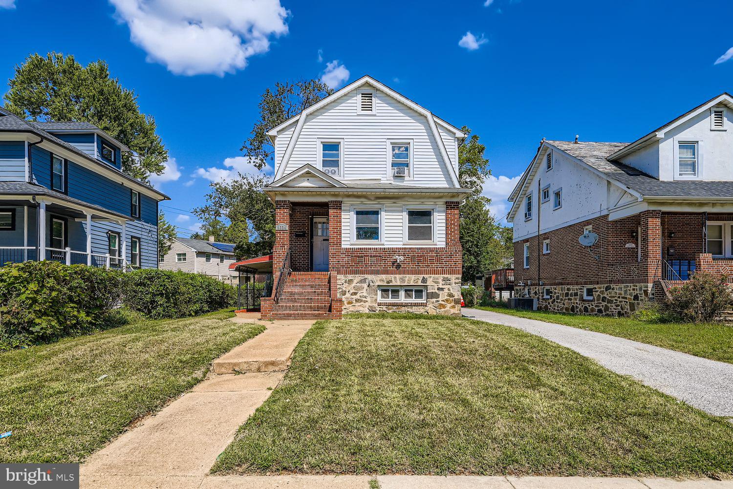 A classic brick detached home offering timeless charm and generous space inside and out. Set on a neatly landscaped lot, this residence features a welcoming covered front porch, bright living and dining rooms with striking beamed ceilings, and a spacious kitchen ready for your personal touch. Multiple bedrooms and baths provide flexible options for family, guests, or a home office. The lower level offers additional storage or hobby space, while the driveway and rear yard add everyday convenience. Perfectly located near shopping, parks, and commuter routes, this property blends character and practicality—ideal for buyers seeking both comfort and value. Schedule your showing today!