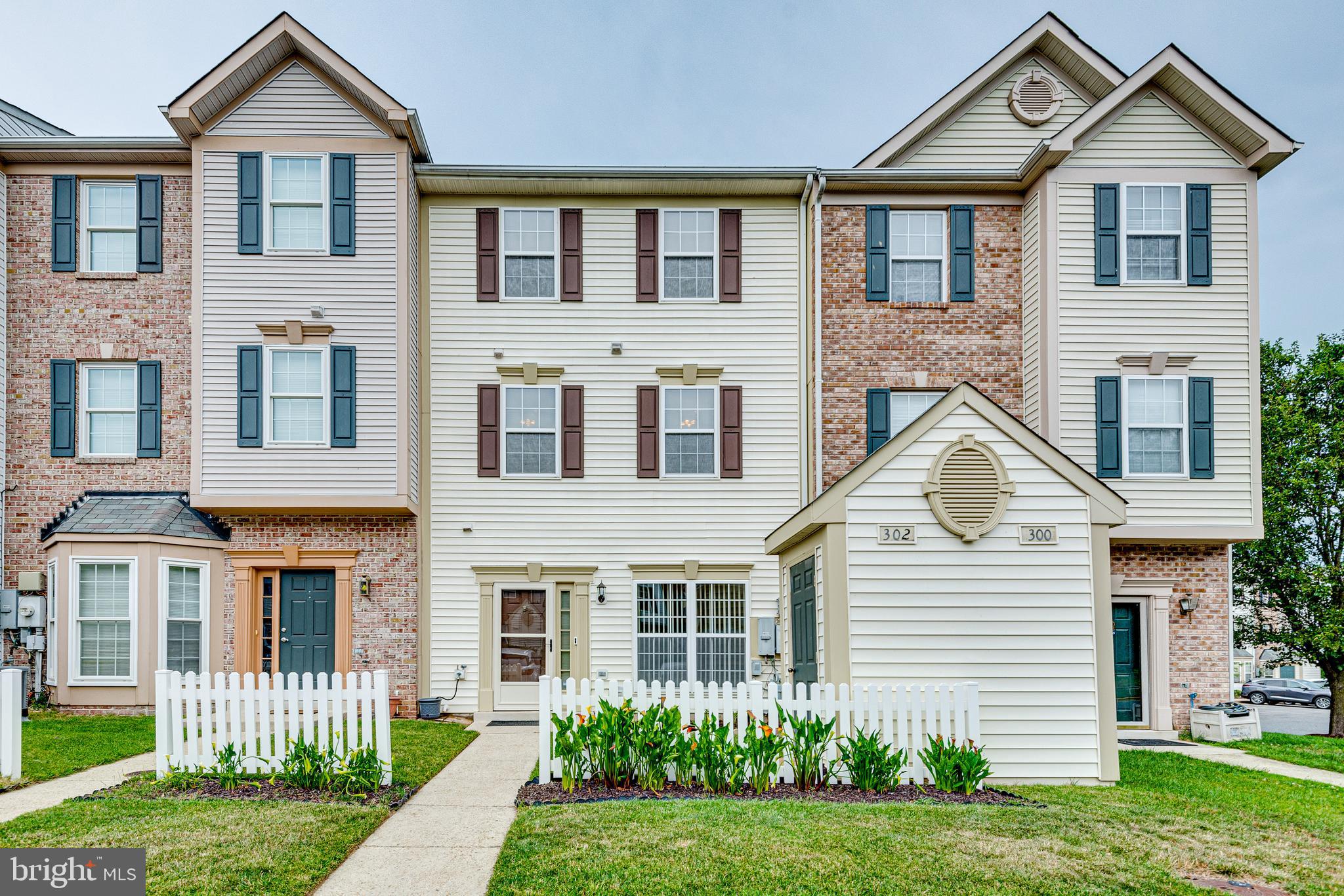 Don't Miss Out on this Well Cared for Townhome in Seven Oaks.  Open Main Level with Kitchen with Double Sinks, Pantry,  Newer Vinyl Floor, and Extra Storage.  Dining Room and Living Room Combination has Wood Floors. Second Floor Offers Two Bedrooms with Full Bath and Laundry Room with Newer Washer and Dryer.  Third Floor with Spacious Primary Bedroom, Walk In Closet (Attic has Extra Insulation with Pull Down Stairs and there is an Area for Additional Storage), Full Bath with Double Sinks and Soaking Tub.  Newer Vinyl in all Bathrooms. Newer Roof, Newer Hot Water Heater, and All Toilets have been replaced.  Storage Shed. Two Assigned Parking Spaces.  Community Amenities include Community Center, Outdoor Pool, Tot Lots, Exercise Room, & Tennis Courts.  One Year HSA Home Warranty.  Conveniently Located to All Major Routes, Shopping, Restaurants, and Fort Meade.  Don't forget to view the Video on this Home.