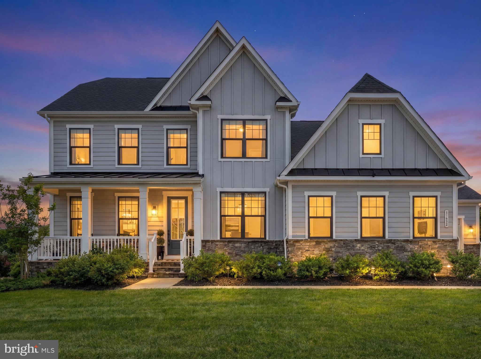 Welcome to this stunning luxury home in the highly sought-after Hartland community In Aldie. Built in 2023, this impressive colonial offers over 4,600 square feet of beautifully designed living space on a premium .43-acre lot. Featuring 5 spacious bedrooms, 4.5 bathrooms, and a rare 3-car side-entry garage, this home blends modern elegance with everyday functionality. 

Step inside to an open-concept floor plan filled with natural light, high ceilings, and pristine wide-plank hardwood floors throughout the main level.  This home is highlighted by a gourmet eat-in kitchen with a large center island, double ovens, stainless steel appliances, and seamless flow into the main living areas — perfect for entertaining or everyday living.  Other features on the main level include a spacious dining room, designated home office, and a separate room that can be used as an in-law suite, or second office. 

Entertain family and friends in the fully finished walk-up basement which provides additional versatile space for recreation, room for overnight guests, or a home theater. 

Upstairs, retreat to generously sized bedrooms including a luxurious primary suite designed for comfort and privacy.  Unwind in the primary suite which contains hardwood floors, his and hers walk-in closets, a spa like bathroom with dual vanities, large soaking tub, and extended glass shower.  The children's bedrooms include one room with its own en suite bath, and two rooms that share a jack and jill bathroom. 

Enjoy outdoor living on the spacious lot with room to relax, play, or create your dream backyard oasis.

House has an electric vehicle charger in the garage and the whole house has pathways for future solar panels.

Located in the heart of Loudoun County with access to top-rated schools, community amenities, shopping, dining, and commuter routes, this exceptional home offers the perfect blend of luxury, convenience, and lifestyle. Don’t miss this rare opportunity to own a nearly new home without the wait for new construction.