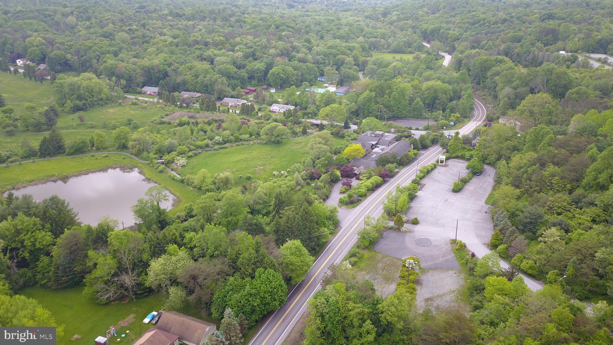 Stunning New Development Opportunity on a Former Golf Course

Welcome to an exceptional real estate offering that combines luxury, history, and boundless potential. This 431.31-acre property, once home to a premier golf course, presents an extraordinary canvas for development, with endless possibilities for residential, commercial, or mixed-use projects.

Key Features:
431.31 Acres of Pristine Land: Expansive and scenic, the property offers breathtaking views and diverse topography, ideal for luxury estates, community living, or a visionary development project.

The former clubhouse is  7942 square feet of endless possibilities.  This stately clubhouse boast ample space for community events, private gatherings, or an exclusive amenity center for residents. The grandeur and charm of this structure make it the perfect centerpiece for your development.

Charming 3,980 sq ft Ranch Home: Nestled in a prime location on the property, this expansive ranch-style home offers captivating views of the surrounding landscape. Whether you’re looking for a primary residence or a guest house, this home provides ultimate comfort with a blend of modern amenities and timeless appeal.

Endless Development Potential: The vast acreage offers flexibility for creating a range of residential, recreational, or mixed-use spaces. With zoning flexibility and ample space, the opportunities are as expansive as your vision. Build a private community, an estate-style neighborhood, or explore innovative land uses—this is truly a once-in-a-lifetime opportunity to shape a new and dynamic neighborhood.

Beautiful Views & Natural Surroundings: The property’s elevated topography ensures panoramic views of rolling hills, lush greenery, and the serene beauty of the land. Perfect for creating an idyllic lifestyle that merges nature with modern living.

Prime Location: This extraordinary property is situated in a highly desirable area, with easy access to local amenities, transportation hubs, and other recreational activities. It’s the ideal place for those looking to build a distinctive community while maintaining proximity to urban conveniences.

This is more than just a property—it’s a once-in-a-generation opportunity to create something truly special. Whether you’re looking to develop a thriving neighborhood or enjoy the privacy of a luxury estate, the potential here is limitless.

For more information or to schedule a tour, contact us today.