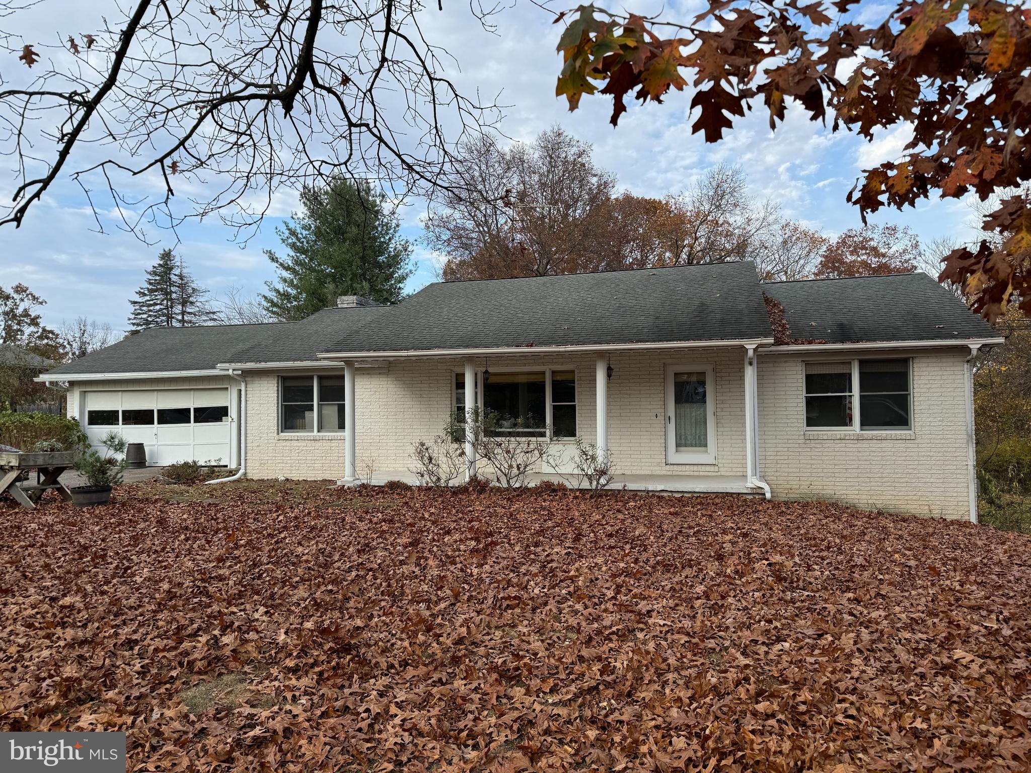 NICE RANCHER IN MARTINSBURG, WV! This home features 2 bedrooms, 2.5 bathrooms, kitchen, dining room, living room, office, basement family rooms, library, laundry room, and more! The entire basement is finished and features walk-out sliding doors! Hardwood floors extend through nearly the entire home! Also with a carport, and an enormous detached garage/building. The outbuilding is a 24x28 upstairs and 22x26 in the downstairs garage. Beautiful setting with deer often visiting in the yard of the home! This home is a must have, come make it your own! This property will be offered at auction on Thursday December 5, 2024 @ 3:00pm. The List price in no way represents a minimum, starting, or acceptable bid.