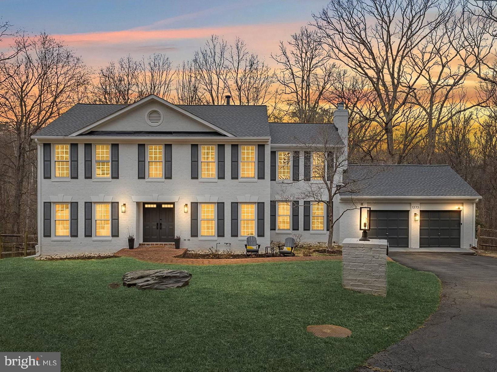PRICE IMPROVEMENT! Welcome to 1373 Carpers Farm Way in Vienna, Virginia—where meticulous, top-to-bottom updates meet the epitome of tranquil surroundings. This spacious residence boasts 5 large bedrooms and 3 beautifully updated full bathrooms, including a luxurious primary suite complete with a walk-in closet and a 4-piece ensuite bath. Wake up to serene views of the lush, private setting, which overlooks mature trees and protected parkland near Difficult Run and the Cross Country Trails.

**
The heart of this home is a chef's dream kitchen, fully updated in 2022, and featuring modern appliances and high-end finishes. The entire home has been thoughtfully upgraded, including updated bathrooms, a brand-new roof installed in 2025, new windows in 2023, and a 2-zone HVAC system, also installed in 2023. Gleaming hardwood floors have been refinished, and plush new carpeting was installed in 2021.

**
The main level welcomes you with a grand foyer, formal living and dining areas, as well as a private office (or an additional bedroom with a closet). The eat-in kitchen boasts perfect sightlines to the cozy family room, which features a wood-burning fireplace. Step out onto the back deck directly from the kitchen, making alfresco dining and enjoying the park-like setting effortless. The main level also includes a pantry, a separate laundry room equipped with a top-of-the-line LG dual washer and dryer, and a convenient half bathroom. The lower level is perfect for movie nights, guest accommodations, or a fantastic play area. Downstairs, you'll find a large guest room with 2 walk-in closets, another updated full bathroom, and ample storage.

**
This property sits on a private pipestem at the end of the neighborhood, ensuring tranquility with no through traffic. Outdoor living spaces abound, including a covered and uncovered deck, a flagstone back patio, and a fully fenced backyard. A 2-car garage completes this exceptional home. For those who love hiking, miles of continuous trails are accessible directly from your backyard.

**
Not only is this home zoned for Great Falls schools (Colvin Run, Cooper, Langley), but it's also located in the highly sought-after Carpers Farm neighborhood, which hosts a variety of annual events that foster a strong sense of community. Just a short, convenient distance from Great Falls, Tysons Corner, downtown Vienna, and Reston Town Center… Here it is: fully updated and tucked away on the neighborhood’s best lot—ready for you to fall in love.