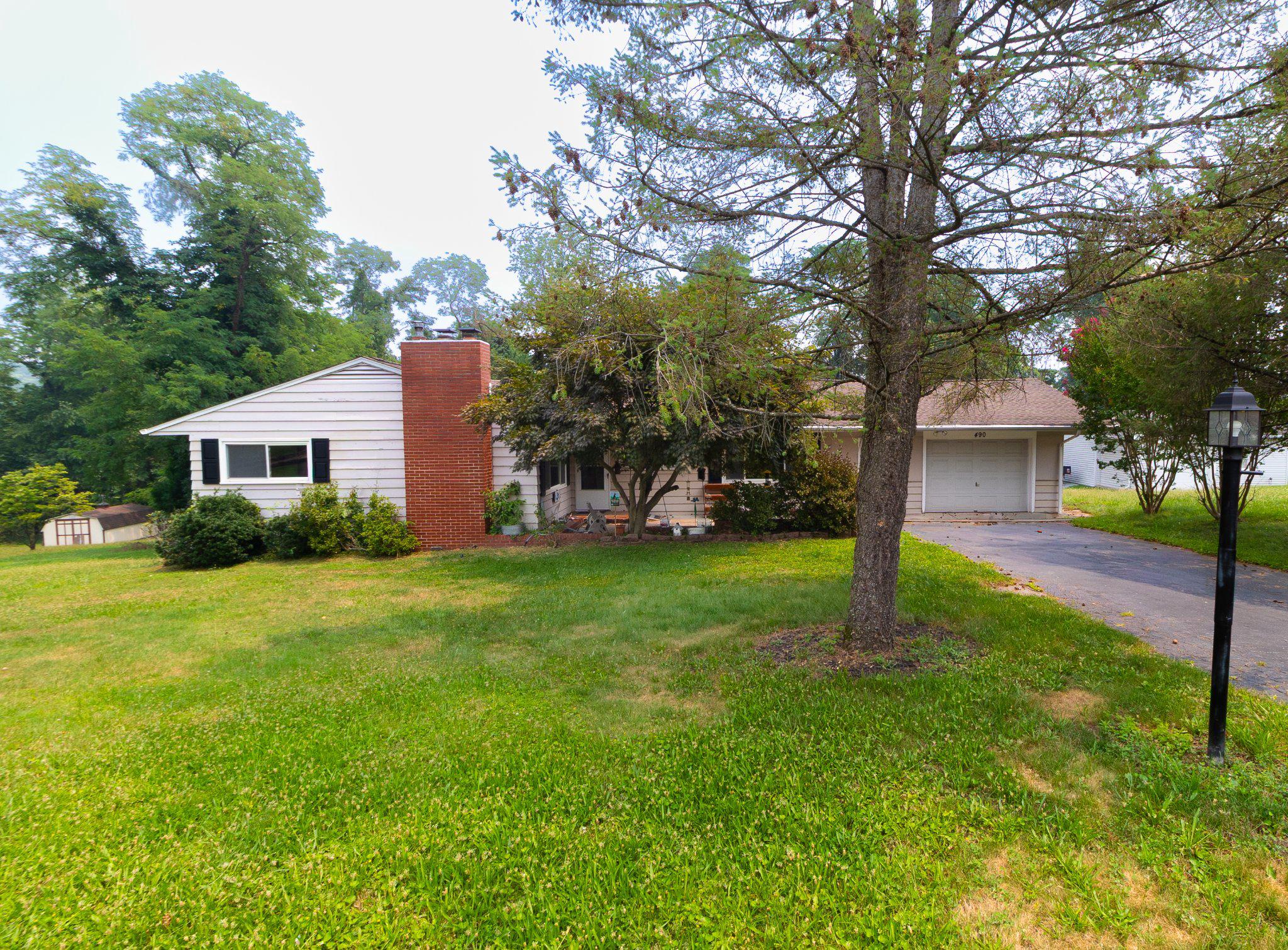 This lovely home on a large fenced lot backs up to trees . 3 spacious bedrooms and 2.5 bathrooms along with a large kitchen with a lot of counter space! Extra large dining area with room for a sitting area.  Oversized garage with extra storage area that can be accessed from the back yard.  The basement area with outside entrance and full bathroom can provide a separate living area for guests or family members. Add in the convenient location and you will have everything!