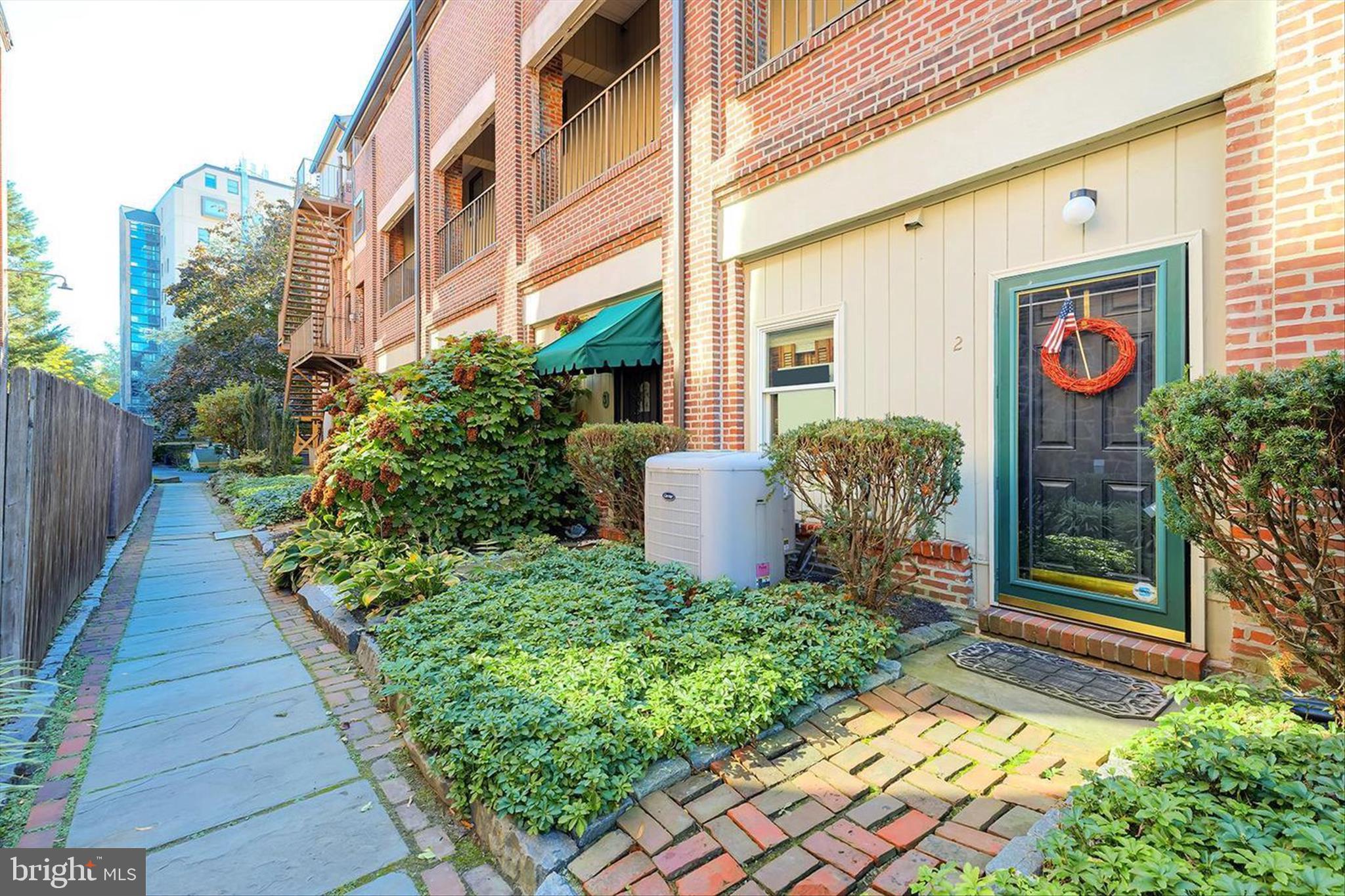 Experience waterfront living with character and style in this beautifully updated one-bedroom condo tucked along the scenic Brandywine River. Blending industrial-inspired design with warm, inviting touches, this residence offers exposed brick walls, wood beam accents, and captivating river views from a private balcony that truly sets the tone for the home.
Located in the desirable Superfine Lane community, the building welcomes residents with secure keycard access and charming garden-style entryways. Inside, the thoughtfully designed layout unfolds into an open living space filled with natural light and architectural detail. Hardwood flooring, concrete girder ceilings, and oversized sliding glass doors create a modern loft-style atmosphere while maintaining a cozy, comfortable feel.
The galley kitchen has been tastefully updated with granite countertops, stainless steel appliances, custom cabinetry, tile flooring, and rich textural elements that complement the home’s industrial aesthetic. The spacious bedroom offers a peaceful retreat with dramatic floor-to-ceiling brick detail and a large window that brightens the space throughout the day.
Step outside onto the private balcony and take in relaxing views overlooking the water, the perfect backdrop for morning coffee or unwinding at the end of the day. Conveniently located near downtown Wilmington dining, entertainment, and regional transportation, this condo offers an ideal blend of urban convenience and waterfront charm.