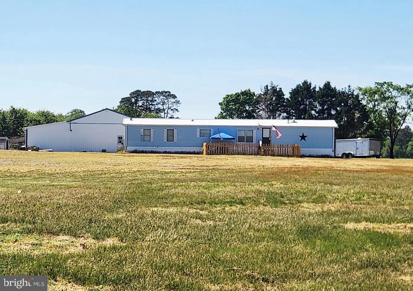 Back on the market due to no fault of seller. Country Living with Space, Functionality & Endless Potential on 6.56 Acres!

Welcome to your slice of rural paradise! Nestled on 6.56 sprawling acres, this versatile property offers the perfect blend of comfortable living, wide-open space, and serious utility for hobbyists, business owners, or anyone craving room to breathe.

This home features 3 bedrooms and 2 full bathrooms, including a private primary suite with its own master bath. Recent updates provide peace of mind, including a brand-new HVAC air handler (installed December 2025), a new dishwasher, and a water treatment system—helping ensure comfort and efficiency for years to come. Seller willing to install new carper prior to settlement. 

Step outside and you’ll immediately appreciate what makes this property truly special:

Massive garage (approx. 30’ x 50’) – ideal for storage, workshop space, equipment, or business use
🛠️ Additional 10’ x 12’ storage shed – perfect for tools, lawn equipment, or extra storage
🌾 Expansive open acreage – great for farming, recreation, or future possibilities
🌳 Peaceful rural setting with plenty of room to expand or customize

Shared driveway easement exists.

Whether you’re looking for a homestead, a place to run your operation, or simply want land and flexibility, this property delivers unmatched potential. Property being sold as is.

📍 Don’t miss your chance to own a property where space, function, and opportunity come together!