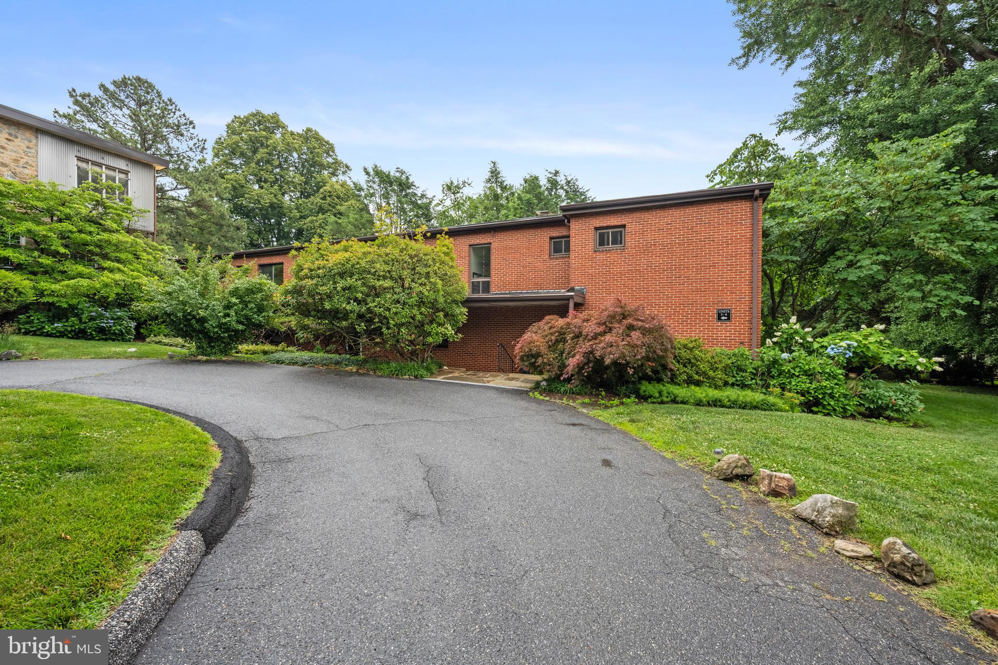 Surprise, Surprise, Surprise! Lakehurst Condominiums, nested in the beautiful, lush verdant  Baltimore County neighborhood of Lakehurst. Most  people don’t even know about this hidden jewel. 6003 was created by renowned Baltimore architect Alexander Cochrane and a group of Bauhaus architects  in the late 1940’s. Architects and historians still drive by to take a gander at this unique property. Unit number 5 has so much to offer!! Central air conditioning, working fireplace, new second floor bath with walk in shower, additional full bath on first floor. New carpeting and fresh paint on second floor. Parquet floors on first floor and walk in storage closet on first floor. Private patio. Sun drenched rooms that are super bright. Super convenient location. Lake Roland friendly. Easy to enjoy. Welcome!