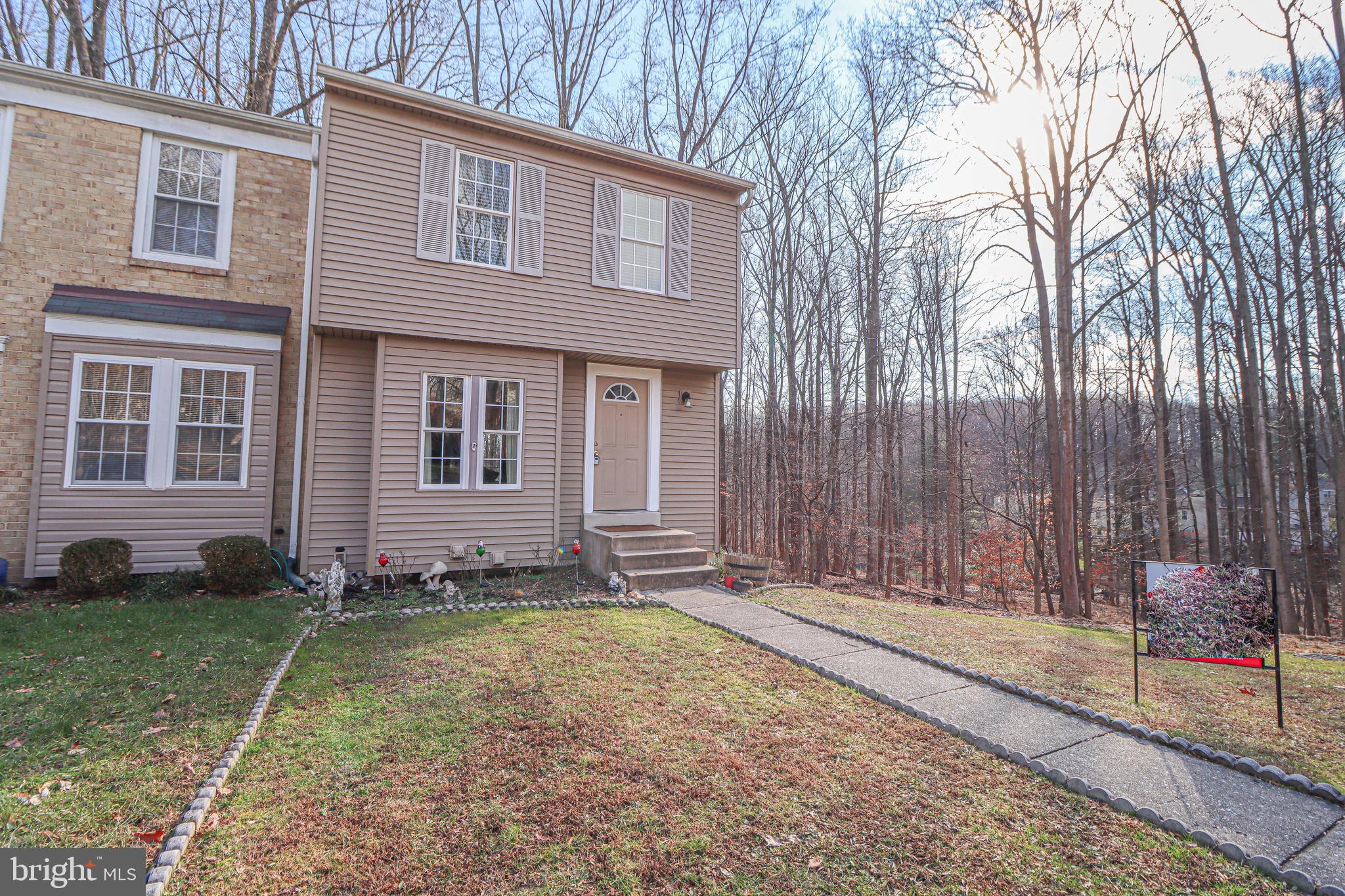 One of the highlights of this property is its premium location – an end unit backing up to a picturesque expanse of trees.  Welcome to this charming maintained  3-bedroom, 2-and-a-half-bathroom, nestled in a serene neighborhood that provides both comfort and convenience.   As you enter through the front door, you are greeted by the warmth of hardwood floors that seamlessly flow throughout the main living spaces, creating an inviting atmosphere. The living room, bathed in natural light from large windows, serves as the perfect space for relaxation or entertaining guests along with the large kitchen with granite countertops.   The neutral tones of the freshly painted walls enhance the sense of spaciousness and tranquility.   Upstairs features the primary bedroom with large windows that overlook the lush greenery of the backyard.  Two additional bedrooms, each with their unique charm, share a well-appointed full bathroom, ensuring convenience for the entire household.

The lower level of this townhouse is a versatile space, boasting brand-new carpeting that adds a touch of luxury. This area has the potential to serve as a fourth bedroom or a spacious home office, adapting to your specific needs. A full bathroom on this level adds practicality and convenience, providing an ideal space for guests or extended family members.

In summary, this townhouse is not just a residence; it's a place to call home and it could be yours!!!   Schedule your appointment today.
