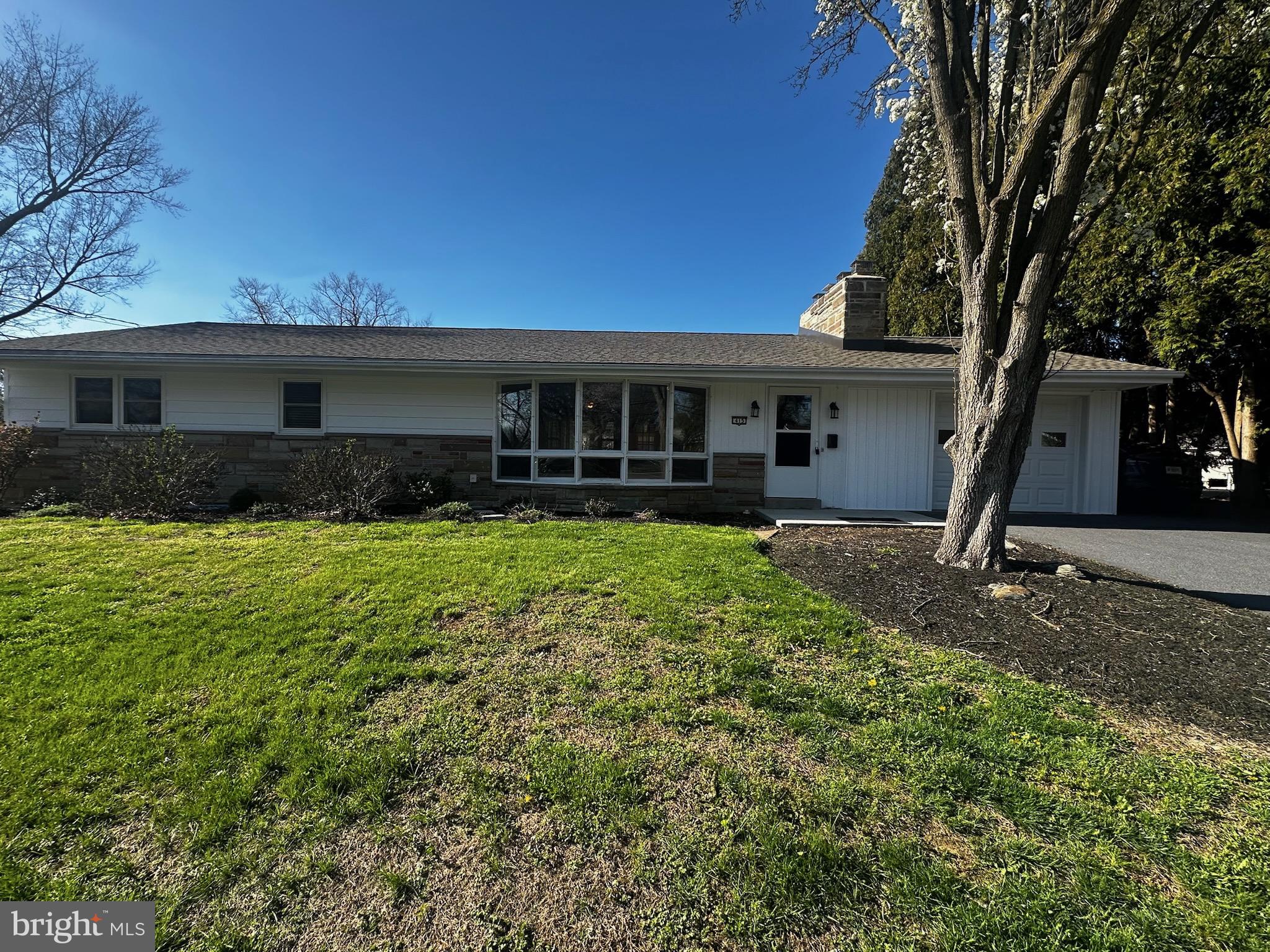 Welcome to Elizabethtown, the heartbeat of South Central PA. Fresh from a remodel, this home is move-in ready! The living room has a vaulted ceiling with a fireplace offering a wonderful space for entertaining. The kitchen is open to the living room and has been upgraded with new appliances, stone coutertops  and pantry.  This home features 3 main floor bedrooms and 1.5 baths,  central air with a heat pump. The lower level features its own entrance and windows for daylight, new bathroom with an oversized shower and space for a bedroom. The large lower-level space could be used as a seperate in law, or other quarters. There is new carpet, new paint, new lighting,  and other flooring recently installed.
An Acre of in-town peace awaits a new owner, with a gently sloping backyard, trees, and a stream.