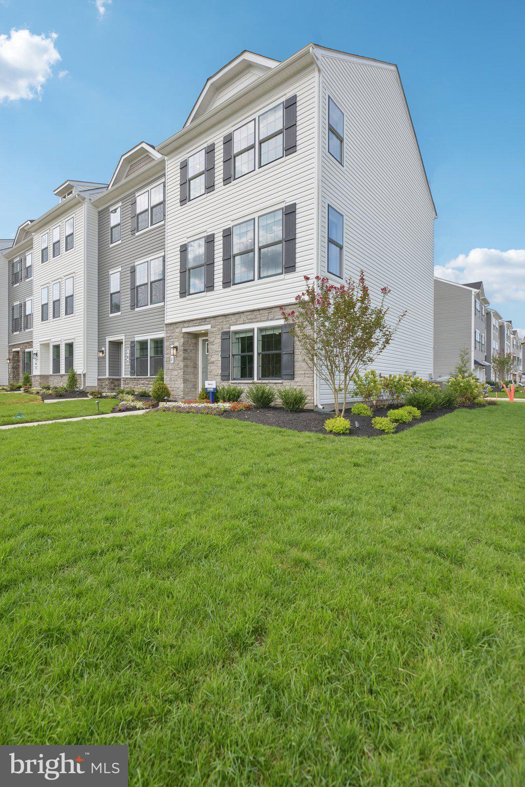 Discover the elegance of the Norris, a stunning townhome offering the latest in smart home technology by Dr. Horton. Spread across three beautifully designed levels, this home features an expansive deck, a modern and open floorplan with 3 bedrooms, 2.5 baths, and a 2-car rear garage, all meticulously laid out within 1,763 sq ft.

The main level showcases a bright eat-in kitchen equipped with recessed lighting and a substantial island, ideal for both gourmet cooking and entertaining. Ascend to the upper level to find a convenient laundry closet and a chic primary bedroom with a walk-in closet and dual vanities. The lower level welcomes you with a charming entry foyer and direct access to the 2-car garage.

Embrace the seamless combination of style and utility in the Norris townhome. Take advantage of generous closing assistance when financed with DHI Mortgage.. Experience contemporary living at its finest in this exceptional townhome.