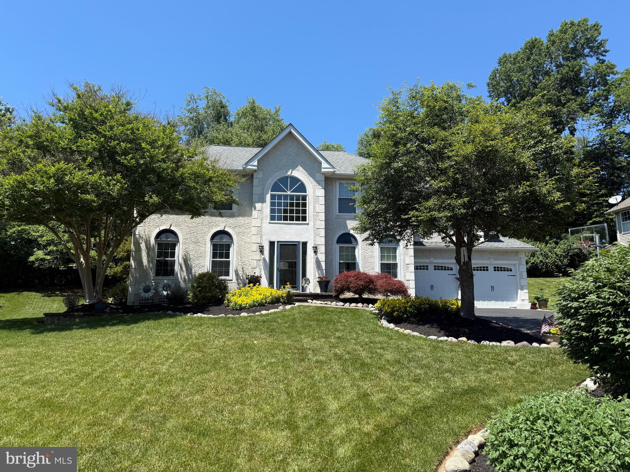 Welcome to 1204 Woodsview Drive in the sought-after Garnet Oaks community and the award-winning Garnet Valley School District. This beautifully maintained home offers the perfect combination of space, comfort, and convenience. A two-story foyer welcomes you into a bright, open floor plan featuring formal living and dining rooms, a private office, an updated eat-in kitchen with tons of cabinets, a pantry and gas cooking, and a spacious family room with a gas fireplace. Upstairs, the primary suite includes two walk-in closets and a private bath with a soaking tub, while three additional bedrooms provide plenty of space for family or guests. The finished lower level is perfect for entertaining, a home gym, or additional living space. Step outside to enjoy the private backyard  ideal for relaxing or hosting friends and family. Attached 2 car garage with an additional shed attached to the rear for all of your outside tools.  Conveniently located near shopping, dining, parks, major roadways, and the Philadelphia International Airport, this home is one you won't want to miss.