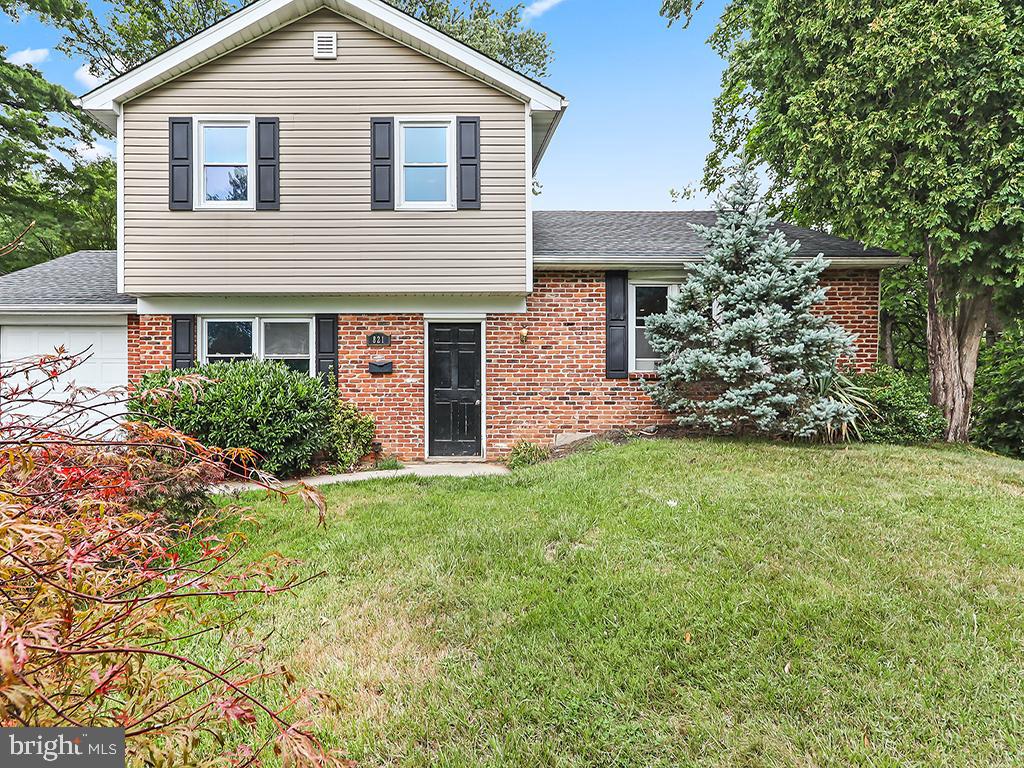 Welcome to this charming home residing in the award winning  Centennial School District! This welcoming split-level boasts a large corner lot, attached one car garage, classic wainscotting, an open floor plan layout with an updated kitchen, and hardwood floors throughout. Warm up by the wood burning brick fireplace on a winter day or watch birds from the French doors that look upon the back yard! This fixer-upper home has great bones and an endless amount of opportunity.  The majority of the home has been repainted and the roof was re-shingled around 2016. This home is close to shops, restaurants, public parks and golf courses. PECO has approved a natural gas pilot project for the neighborhood giving opportunity to switch from oil heat and water to natural gas.  Please note the home is being sold as is. Please do not approach/contact home or owner as this home is still occupied. Seller is related to list agent.