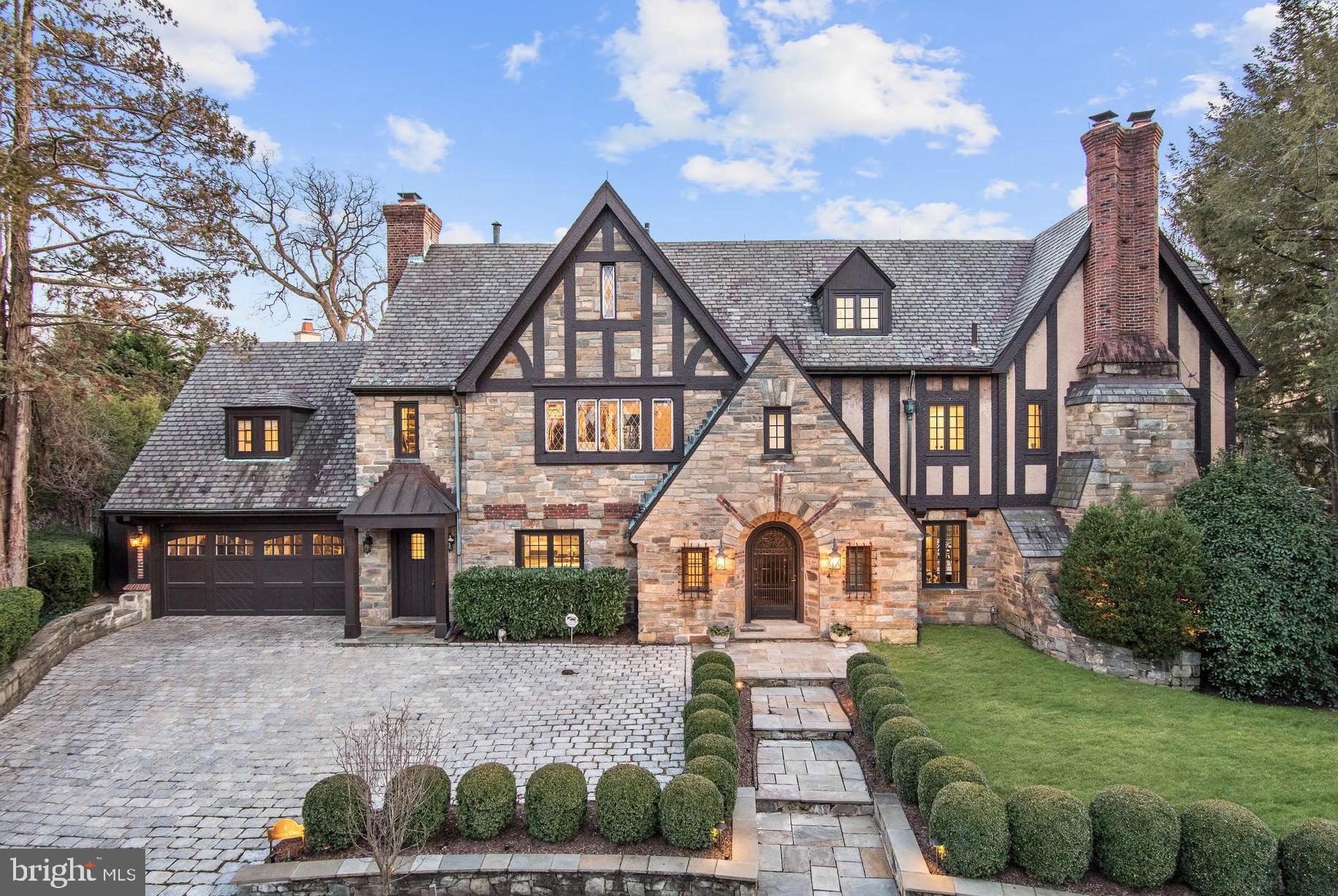 Phenomenal Value!! This exceptional 10,000 square foot,  six bedroom, seven and one half bathroom estate is ideally positioned on prestigious Thompson Circle, a private cul-de-sac in highly sought after Massachusetts Avenue Heights.   Originally built in 1926, this property has been beautifully renovated but still maintains sophisticated, original architectural details throughout. The main level features a Living Room, Dining Room, Sun Room, Study, Family Room, Powder Room, Kitchen and Breakfast Room. The upper levels also provide  two Master Suites and three additional bedrooms. The lower level holds the sixth bedroom, recreation room, and wine cellar. Back patio overlooks park land. Showings by appointment only.