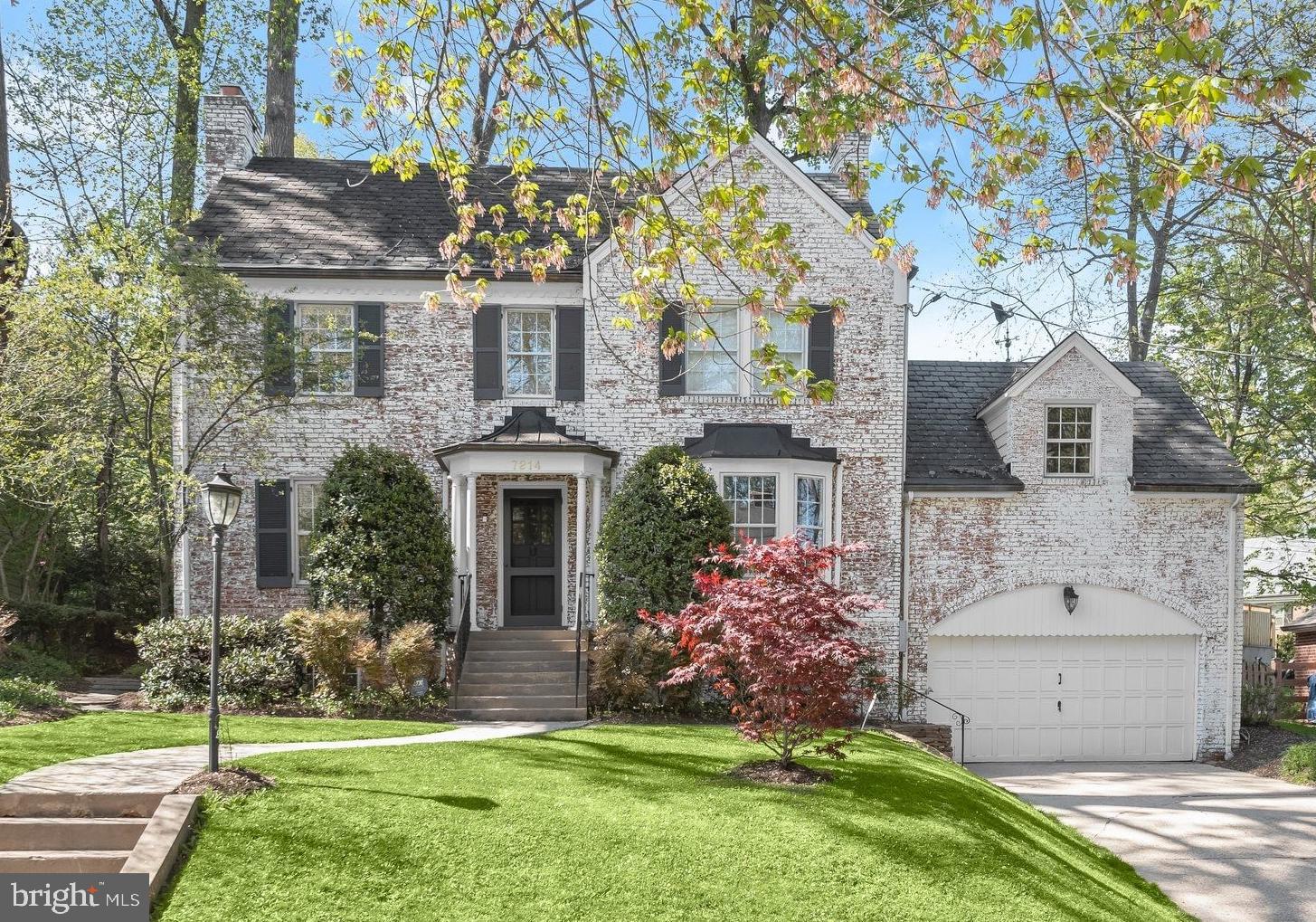 Welcome home to this classic brick Colonial offering timeless charm and generous living space. The main level features beautifully appointed rooms, including a welcoming foyer, formal dining room,  a gracious living room with fireplace, den with a window seat, private office, powder room, and galley kitchen. 

Upstairs, the second level offers three bedrooms and two full baths, including one bedroom with an attached bonus room ideal for a nursery, office, sitting room, or playroom. The finished top floor provides flexible additional living space.

The lower level includes a recreation room with fireplace, guest room, full bath, and a laundry/utility room with walkout access, along with entry to the attached two-car garage.

Outside, enjoy lovely landscaping and a private patio with access from both the kitchen and office, creating an ideal setting for everyday living and entertaining.

Perfectly positioned between two parks and playgrounds, this home offers exceptional convenience to neighborhood favorites including Brookville Market, Brookville Pharmacy, beloved French bistro La Ferme Restaurant, and dry cleaners making daily errands and dining effortlessly accessible while enjoying a true neighborhood feel.