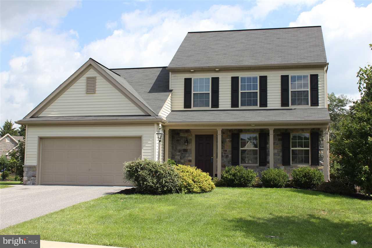 Attractive mix of manufactured stone under front porch and vinyl. 2 car garage and a large composite deck all within the quiet surroundings of a desirable small community in West Hanover Township.  Steps from the nature walking path. Open concept plan. Hardwood in foyer. 3' family room bump-out and gas fireplace. Breakfast area and Island with overhang for stools. Beautiful 16 x16 Azek Deck.. Superior wall basement. Washer, Dryer and Refrigerator stay.