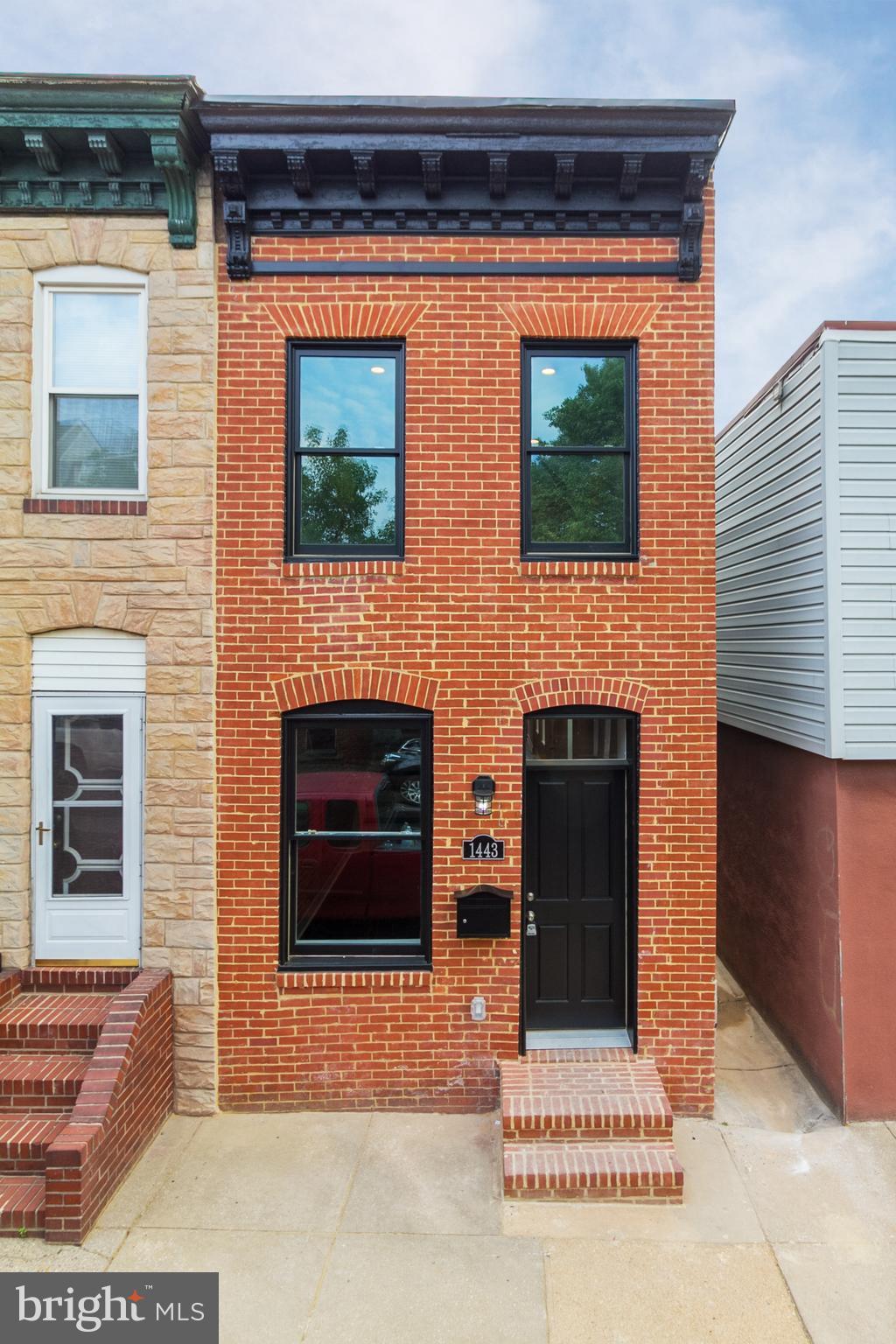 CHAP TAX CREDIT, NEW REHAB, EASY PARKING, GREAT LOCATION AND GREAT PRICE. This 2 BR, 2 and half BA end unit home features tons of natural light, new hardwood floors, exposed brick, quartz counters, SS appliances, interior access to roof top deck, washer/dryer and more. The bedrooms are on opposite ends of the home providing some privacy. New parking pad in rear.