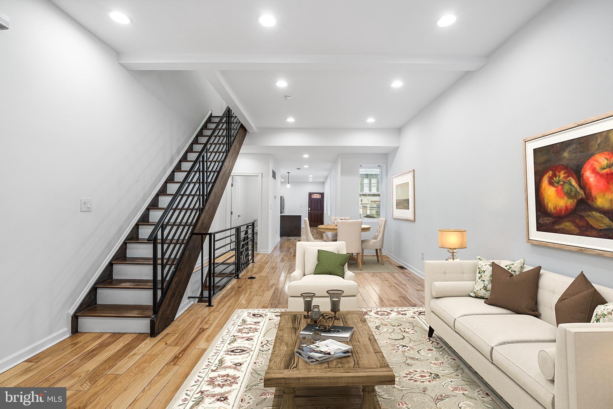 Welcome to Green Street! This beautifully renovated, tax-abated (through 2028) 4-bedroom, 3.5-bath home in the heart of Powelton Village seamlessly blends classic West Philadelphia character with modern comfort.
A striking brick façade and inviting front porch set the tone, while inside, soaring ceilings and an expansive open layout create the perfect space for both everyday living and entertaining. The stylish kitchen is outfitted with stainless steel appliances, granite countertops, a tiled backsplash, and generous seating, flowing seamlessly into a private, fenced backyard ideal for gatherings or quiet outdoor relaxation.

The upper levels offer a thoughtfully designed floor plan with two spacious second-floor bedrooms, including one with an ensuite bath, plus the convenience of in-home laundry.  The top-floor primary suite serves as a private retreat, complete with a walk-in closet and spa-inspired bathroom featuring a double vanity, soaking tub, and walk-in shower. A fourth bedroom offers flexibility for a home office, nursery, guest room, or creative space.  A fourth bedroom provides flexible space for a home office or nursery. Enjoy sweeping city views from the expansive roof deck, while the fully finished basement offers endless possibilities for a gym, media room, plenty of storage or additional living space.

Location is where Green Street truly shines. Just minutes from Drexel University, the University of Pennsylvania, CHOP, 30th Street Station, and Center City, this home sits at the intersection of convenience, strong rental demand, and long-term growth potential. Residents enjoy easy access to some of Philadelphia's leading educational, medical, and cultural institutions, while investors will appreciate the enduring appeal of a location supported by major employment centers and ongoing neighborhood investment.

Currently tenant-occupied through July and generating $2,950 per month in rental income, the property offers immediate cash flow for investors while remaining an exceptional future residence for owner-occupants. Combined with the tax abatement through 2028, this is a rare opportunity to secure a move-in-ready home offering both lifestyle and value in one of West Philadelphia's most dynamic neighborhoods.

Don't miss the opportunity to make this exceptional property your own. Schedule a private tour today!