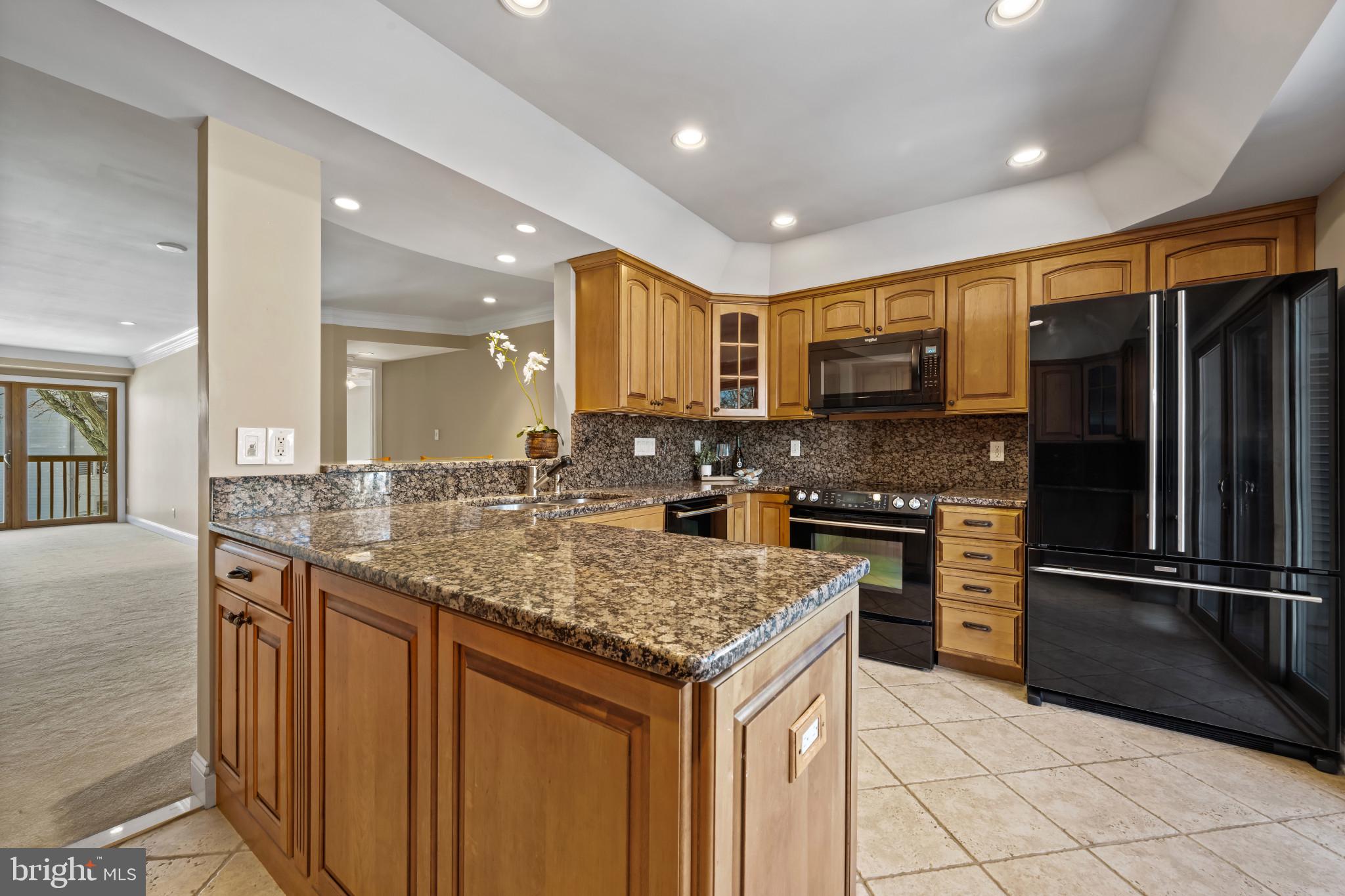 BIG $50K PRICE REDUCTION ON THIS BEAUTIFUL 2 BR UNIT! Look no further! This Chesapeake Harbour marina view condo, is available immediately in one of Annapolis' most sought after waterfront communities. This beautifully renovated 2 BR | 2 BA | 1200 SF condo on the second level is truly turn key offering over $100K in high end improvements crafted with top of the line materials throughout.  Enjoy stunning tranquil marina views from your deck and living space, creating a peaceful coastal retreat. The sumptuous Primary Suite features access to deck, a spa-inspired Bath with an impressive walk in shower and custom closet with built-ins. Recent updates include new carpet throughout and a new oversized water heater, ensuring comfort and peace of mind. Residents of Chesapeake Harbour enjoy an exceptional lifestyle with front entrance security , waterfront dining at the Beacon Waterfront Bar, marina access, waterfront pools, tennis, private beach and walking trails and just minutes to Downtown Annapolis.