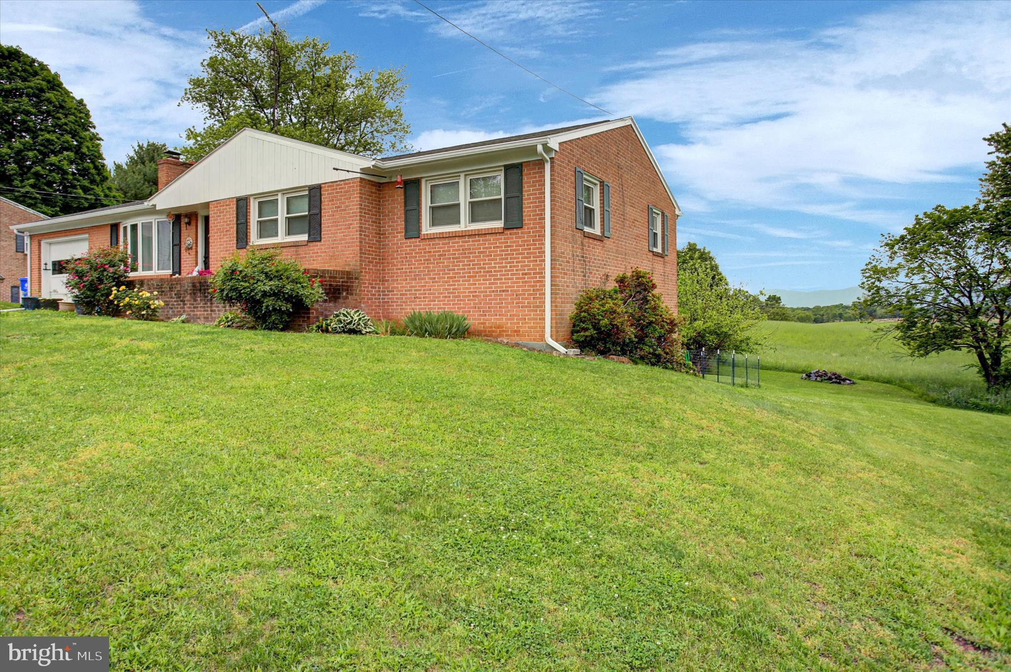 Nestled in a serene neighborhood, this charming 3-bedroom, 1.5-bathroom ranch-style home offers a perfect blend of comfort and community. Built in 1967, the brick exterior exudes timeless appeal, while the partially finished basement provides endless possibilities for recreation or storage. Enjoy cozy evenings by the fireplace, creating lasting memories in this inviting space. The expansive 0.37-acre lot offers ample outdoor space for gardening or play, complemented by an attached garage and driveway parking for convenience. This home is ideally situated near local parks, perfect for leisurely strolls or weekend picnics. With easy access to public services and amenities, everything you need is just a stone's throw away. Experience the warmth of this neighborhood and make this delightful residence your own, where comfort meets community spirit.