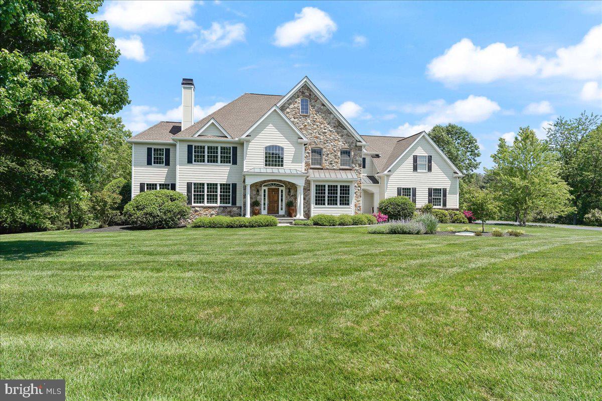 NEW PRICE!!   Welcome to 301 E. Branch Rd, located in the exclusive Fallbrooke community.....a quiet 21 home neighborhood surrounded by open space, conveniently located off of Old Kennett Rd and perfectly situated near both PA/DE border and the Borough of Kennett Square.  This beautiful 5 BR/6.2 BA/3 car garage home has been extremely well maintained by this original owner and has everything you could look for in a home.  Upon pulling up to the home, you'll instantly notice the brand new hardi-plank exterior along with real stone and brick accents, a newer 50 year roof, Anderson windows, 3 car garage and recently re-paved driveway.  The backyard is very private with  a custom pool/spa and fenced in patio area, a composite deck and tons of professional landscaping! Moving inside, you'll love the grand foyer entry with marble flooring, curved staircase, arched room entries and open design.  The grand foyer is flanked by a warm living room area with a gas fireplace, site finished hardwood flooring, and access to the sunroom.  The other side of the grand foyer features an oversized dining room featuring beautiful woodwork, site finished hardwoods and access to the butler's pantry and kitchen area.  As you work your way towards the rear of the home, you can't miss the customized office/library area with built-in bookshelves and work area.  The back of the main floor is nice and open and features a large family room area with fireplace and vaulted ceiling, a gourmet eat-in kitchen with oversized island, upgraded stainless appliances, custom pantry area and access to the butler's pantry featuring a wine refrigerator.  Rounding out the main floor are two powder rooms, one on each side of the house along with a beautiful mudroom featuring custom built-in's.  The upper level features plenty of room!  The main bedroom suite features a large bedroom with vaulted ceiling, a beautiful sitting room or home office area with custom bookshelves, a spacious bathroom with soaking tub, custom tile shower and dual vanities along with a large walk-in closet with custom closet organizer.  Moving down the hall, you'll find 4 additional bedrooms.....all nicely sized and all with their own full bathroom  and closet, each with built-ins.  Lastly, the upper level features a laundry area with sink and cabinets allowing for easy access and laundry use.  Don't forget about the finished daylight walk-out basement, which provides a great space to entertain, hang out or for different hobbies.  The  basement features a full kitchen with bar top for guest seating, a full bathroom, and two separate areas to sit or hang out, along with another gas fireplace as well as a large unfinished space for storage.  Easily walk-out to the pool and patio area....allowing for a nice inside/outside combo when entertaining.  Other fine details featured in this amazing home are 4 zone HVAC, an oversized well tank, an extremely large 36kw Generac generator and much more!  This home is a must see!  Make your appointment today!